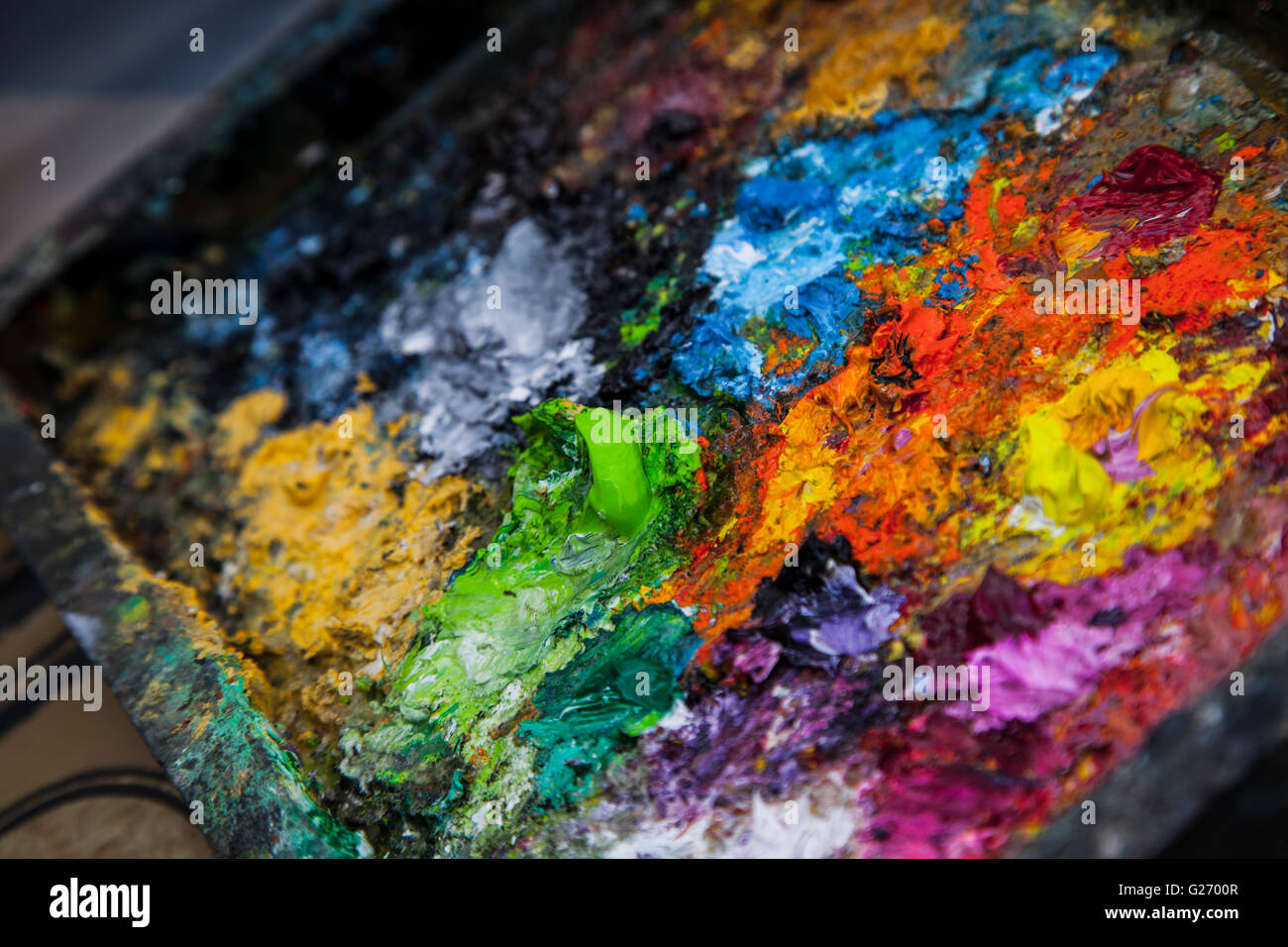 Mixed paint on the palette Stock Photo