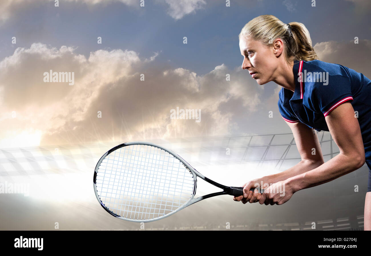 Composite image of tennis player playing tennis with a racket Stock Photo