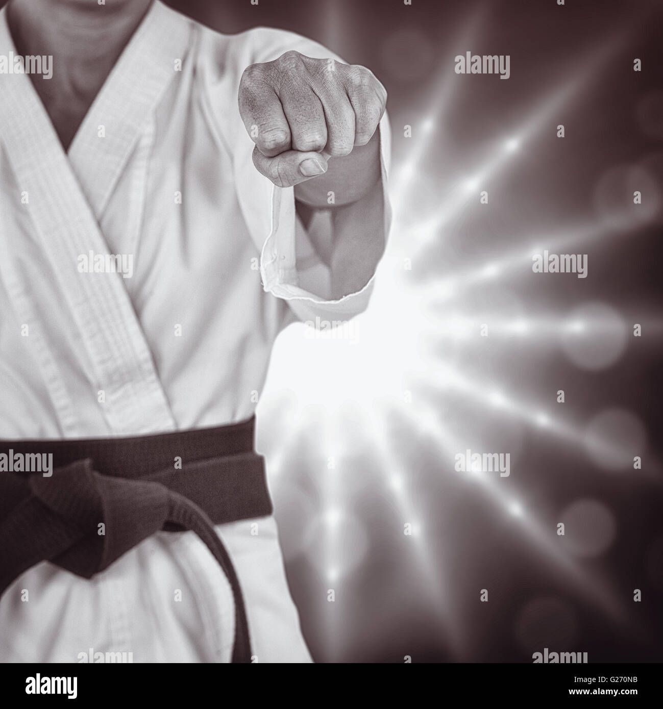 Composite image of female athlete practicing judo Stock Photo