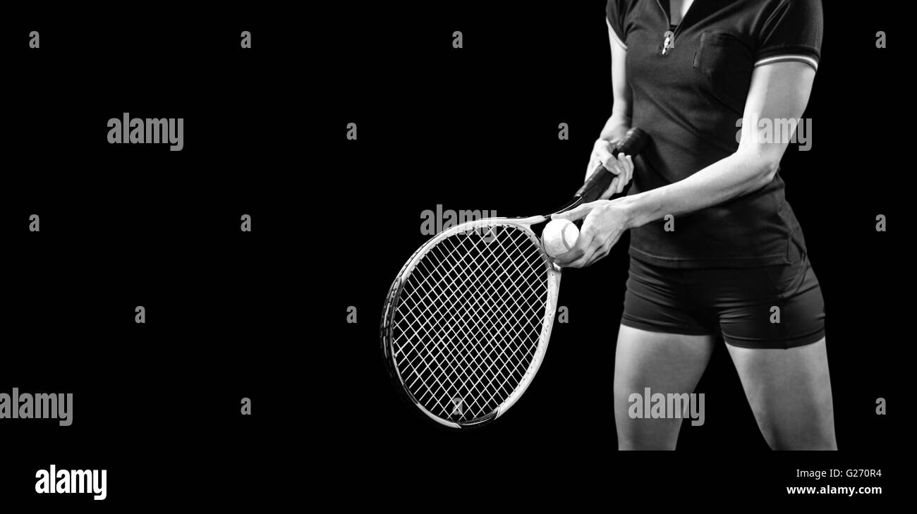 Tennis player holding a racquet ready to serve Stock Photo