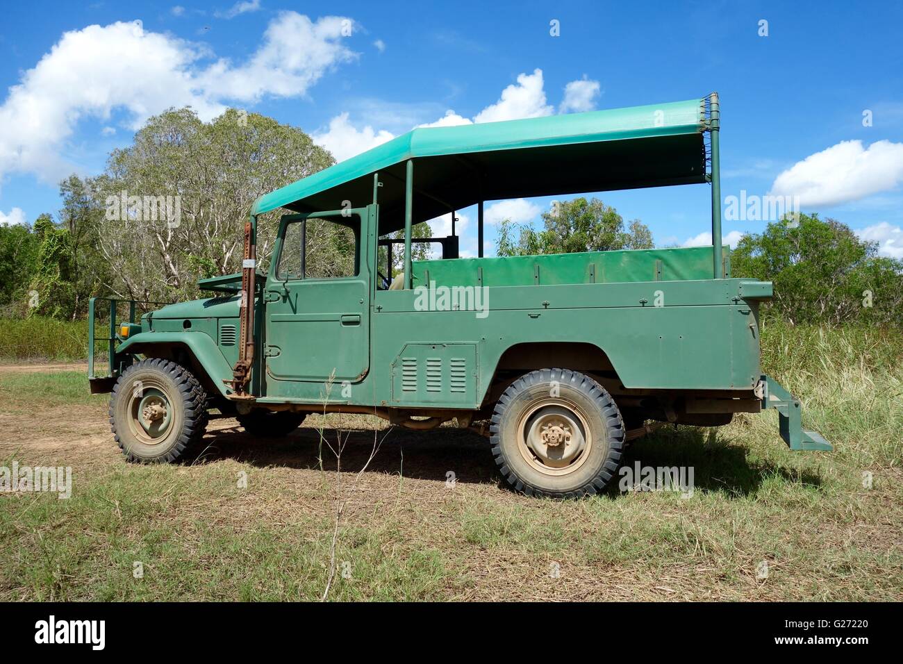 An old passenger Toyota Land Cruiser safari-style four wheel drive (4X4) vehicle in Arnhem Land, Northern Territory of Australia Stock Photo
