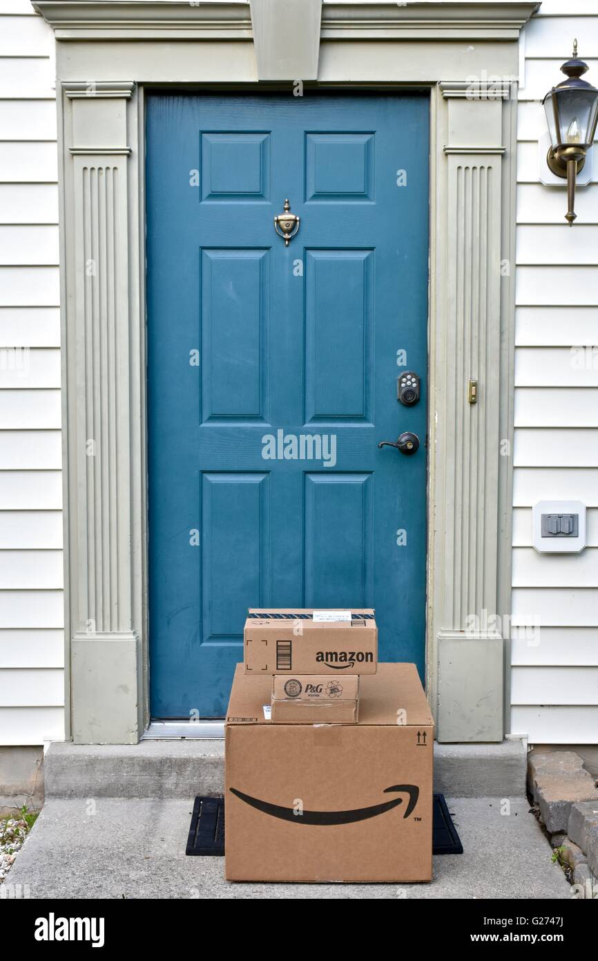 Amazon Prime boxes delivered to a residential home Stock Photo