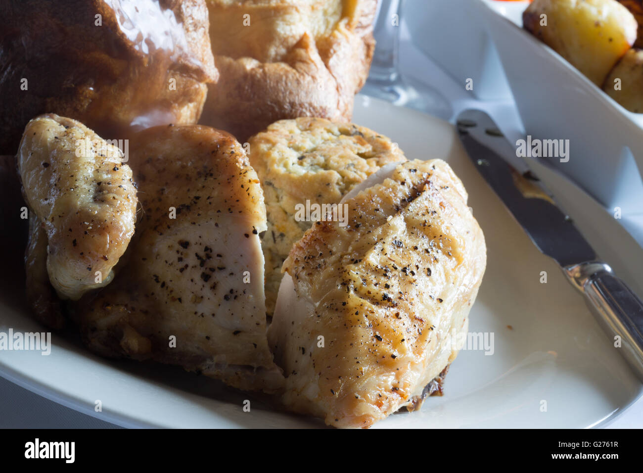 A classic English Sunday roast dinner of Chicken, Sage and Onion