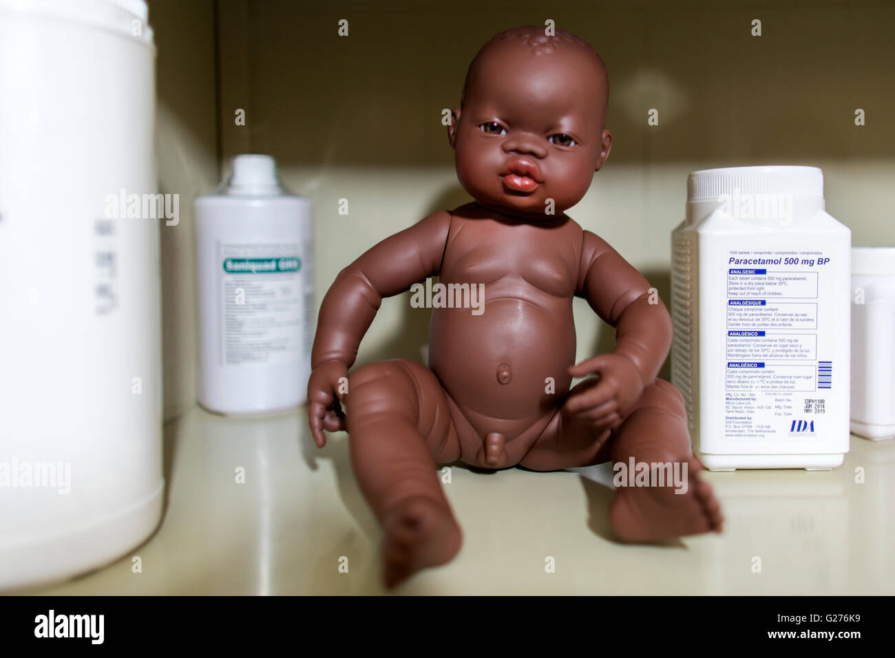 Black cheap plastic doll