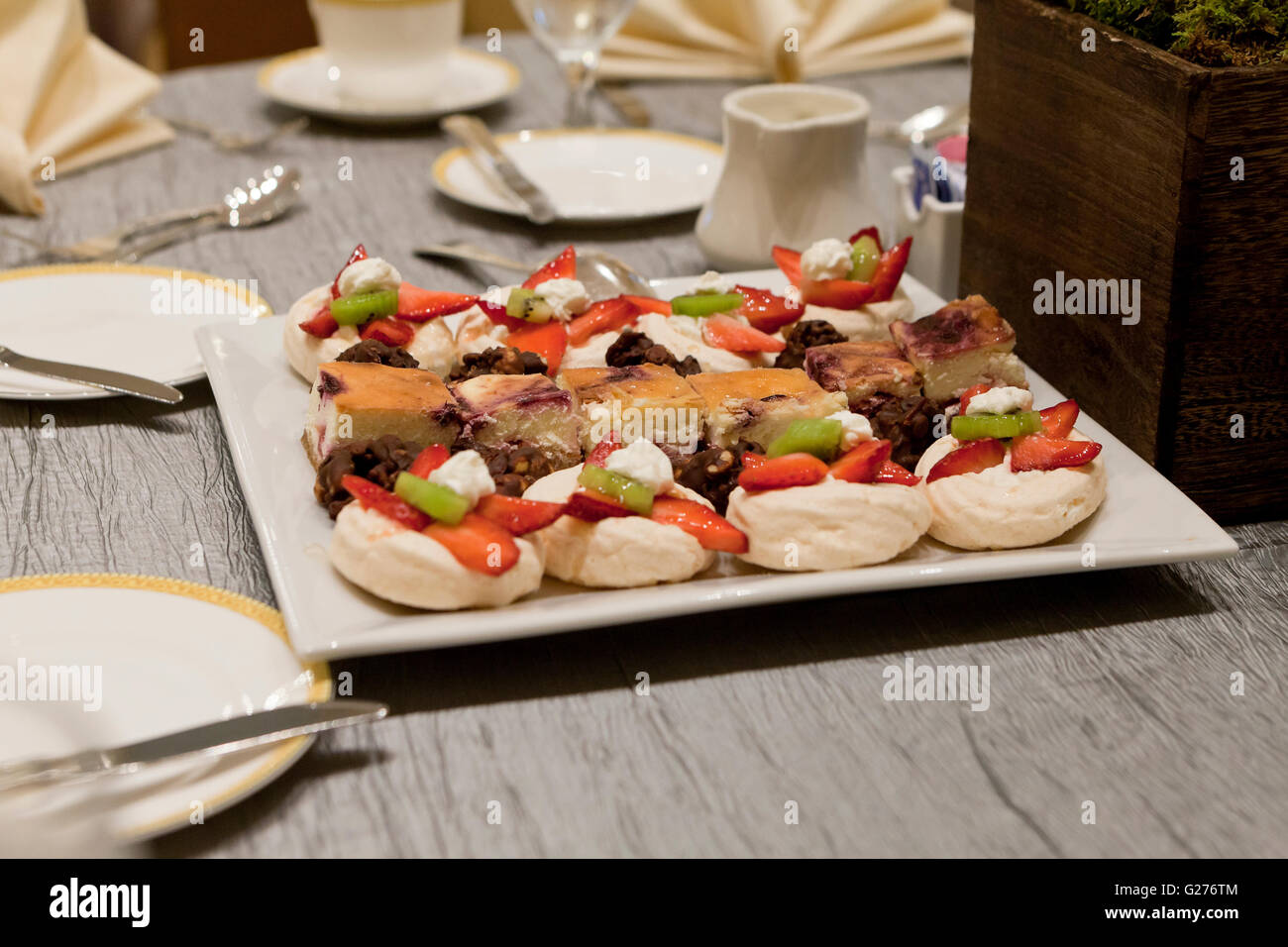 Cookie fruit tarts on dessert plate at a hotel chain - USA Stock Photo