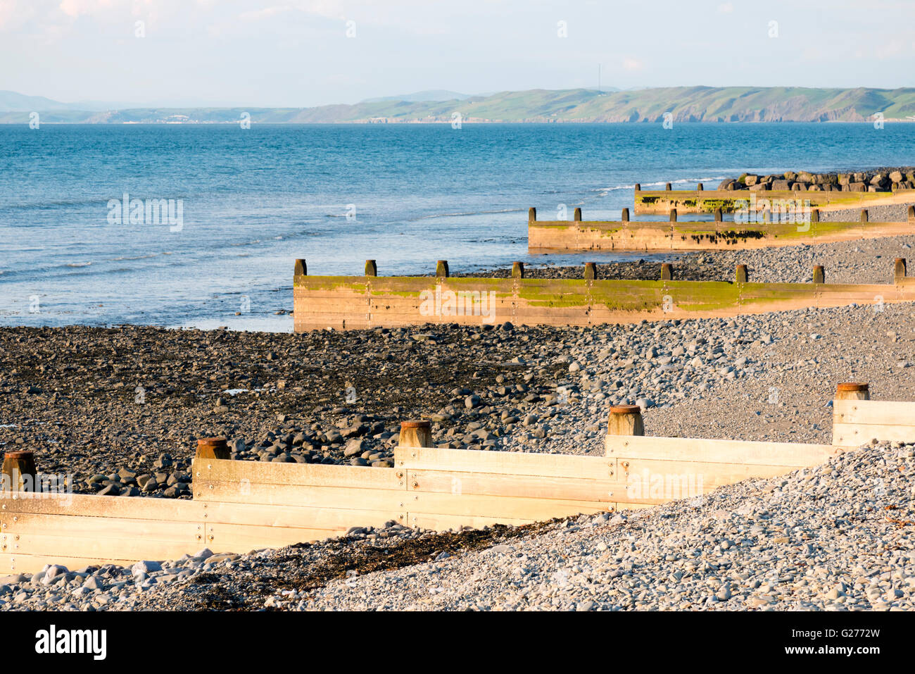 Sea defenses at Aberaeron, Wales, UK. Groynes protecting the shoreline. Stock Photo