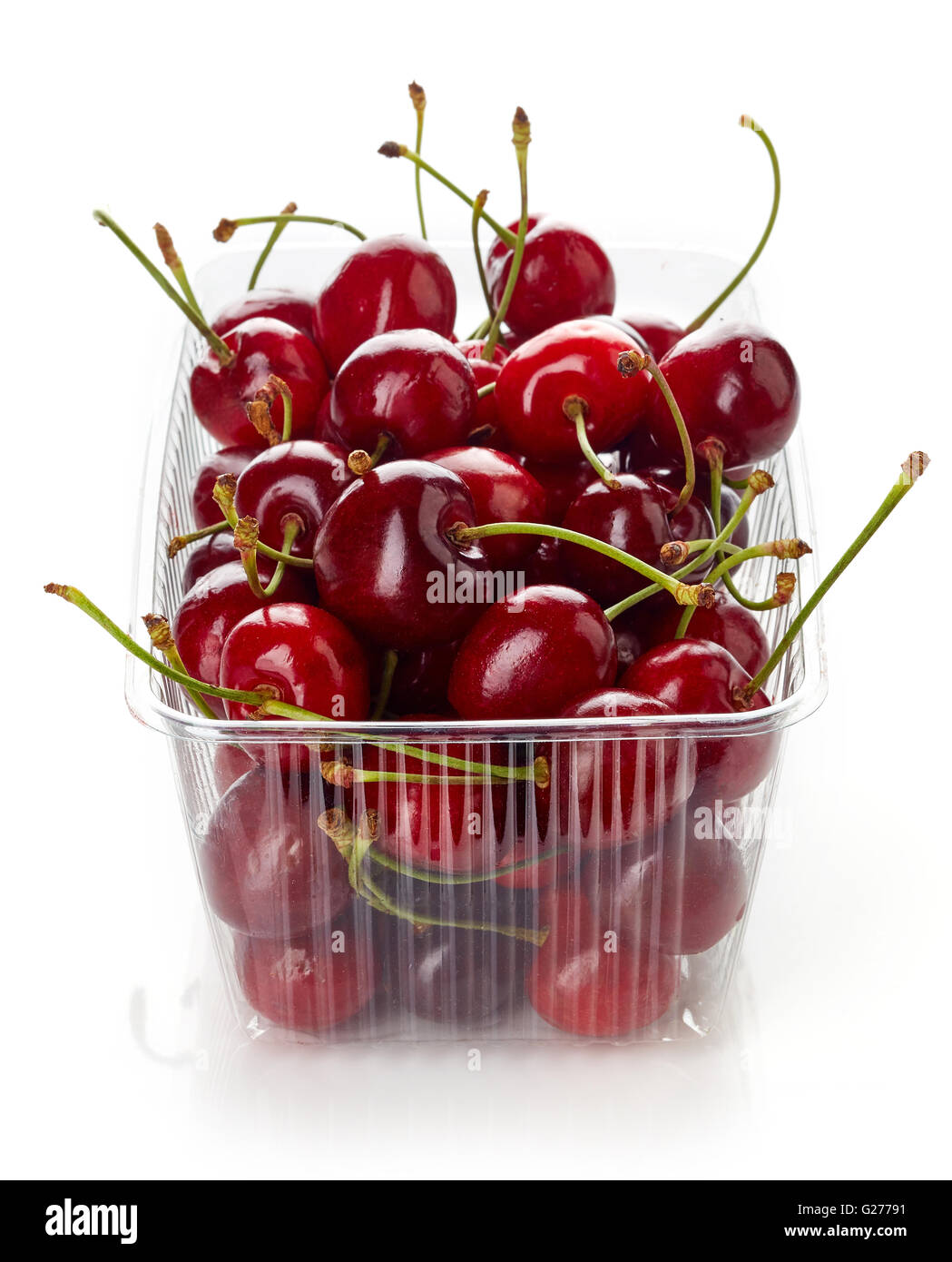 cherry in plastic transparent container box, isolated on white background Stock Photo