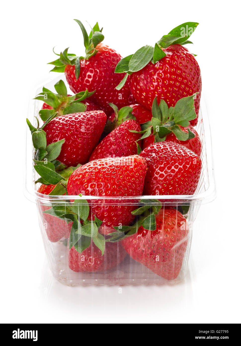 strawberry in plastic transparent container box, isolated on white background Stock Photo