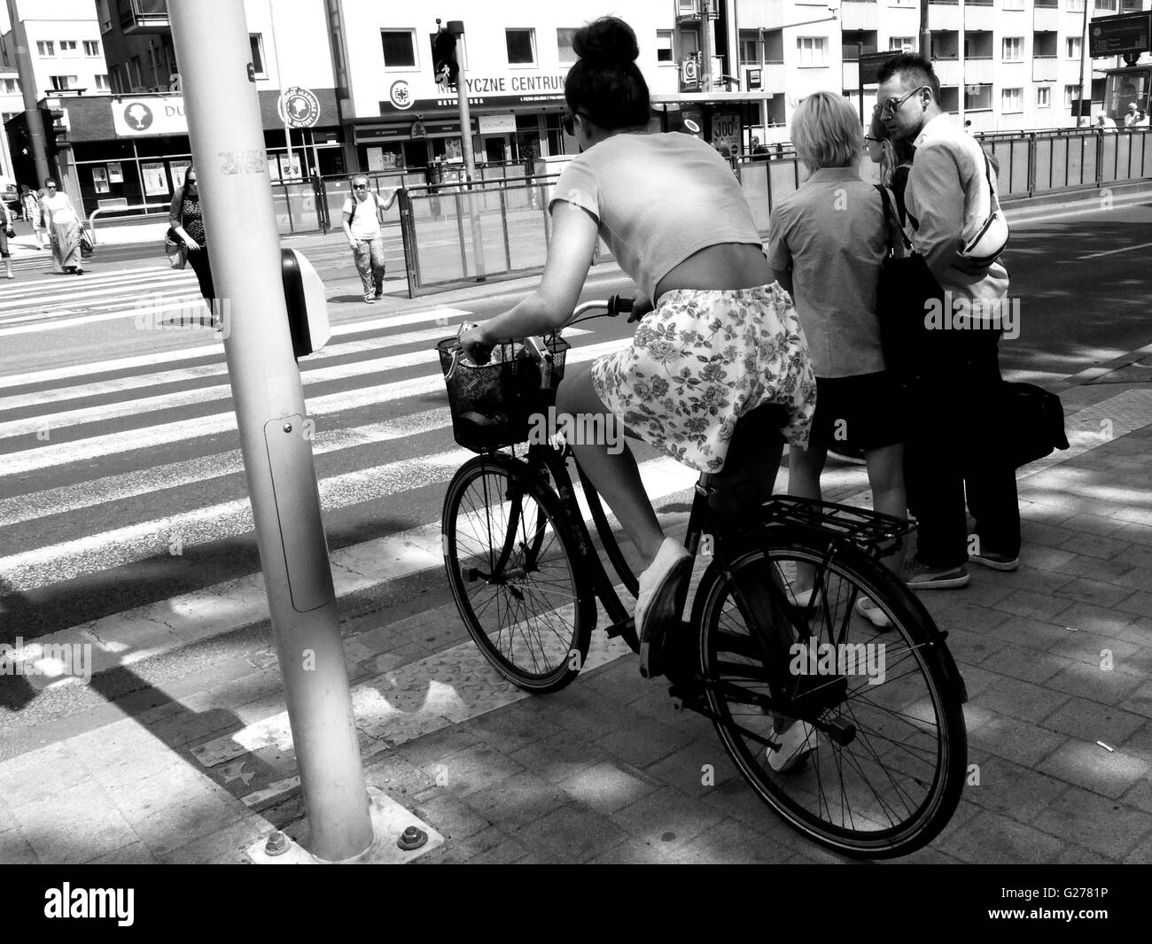 Street crossing on a bike Stock Photo