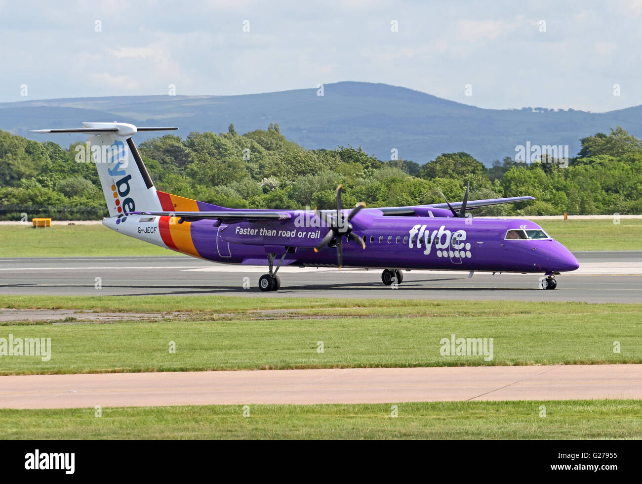 Flybe Bombardier Dash 8-Q400 aeroplane taxiing at Manchester International Airport Stock Photo