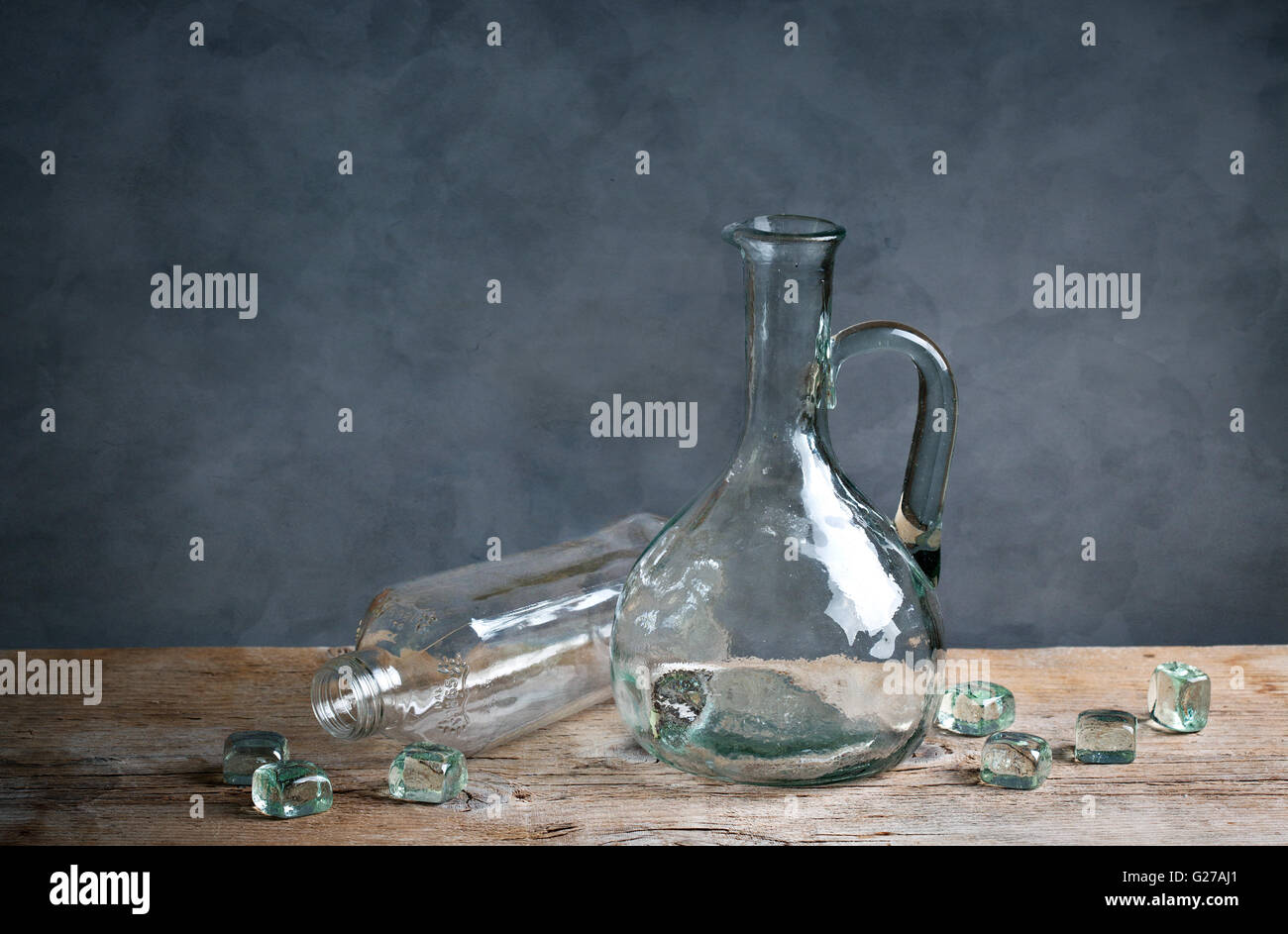 Still Life with differently shaped glass bottles Stock Photo