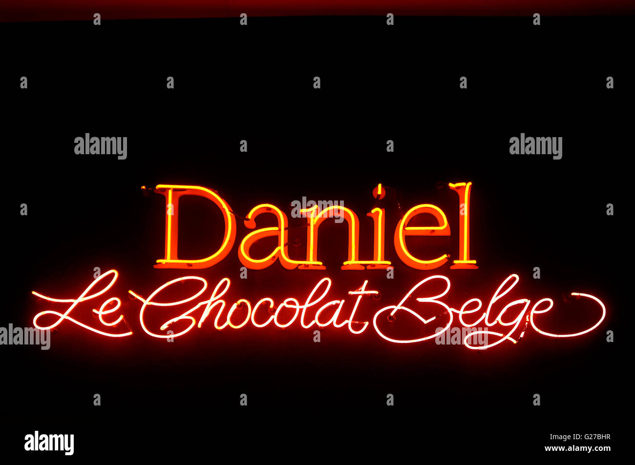 Daniel Chocolat Belge neon sign at night, Vancouver, Canada Stock Photo