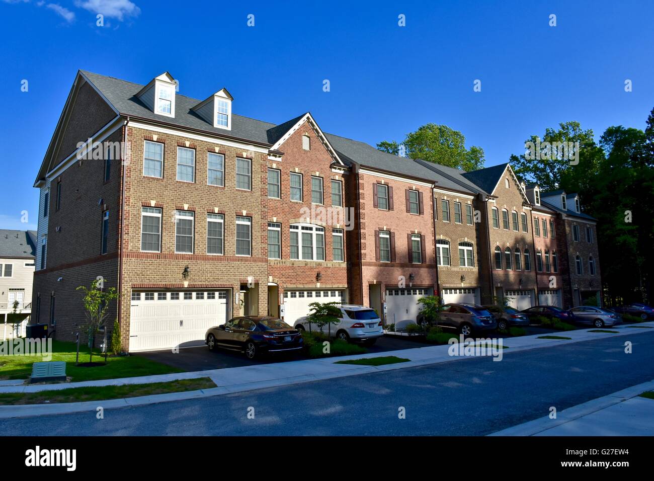 Image showcasing New luxury town homes in a planned community Stock Photo - Alamy