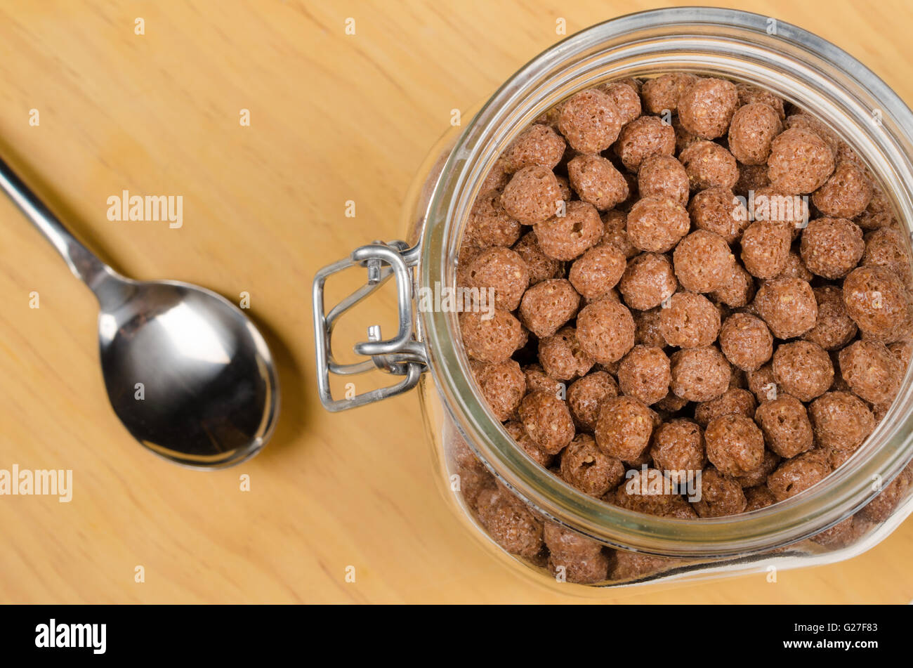 Chocolate flavored cereal balls in a glass jar Stock Photo Alamy