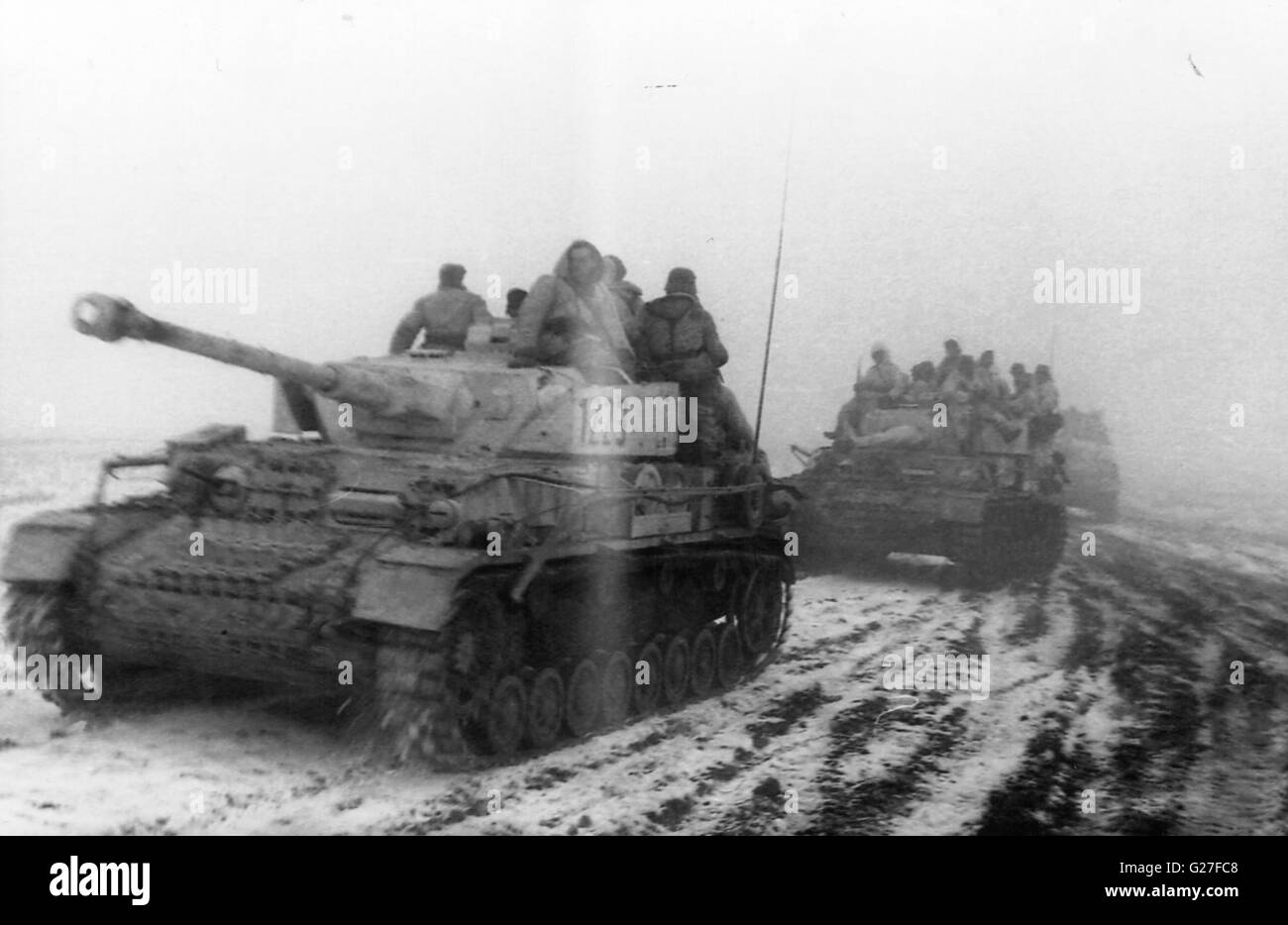 GermanTanks Panzer IV s and Infantry Snow Camouflage Eastern Front 1944 Stock Photo