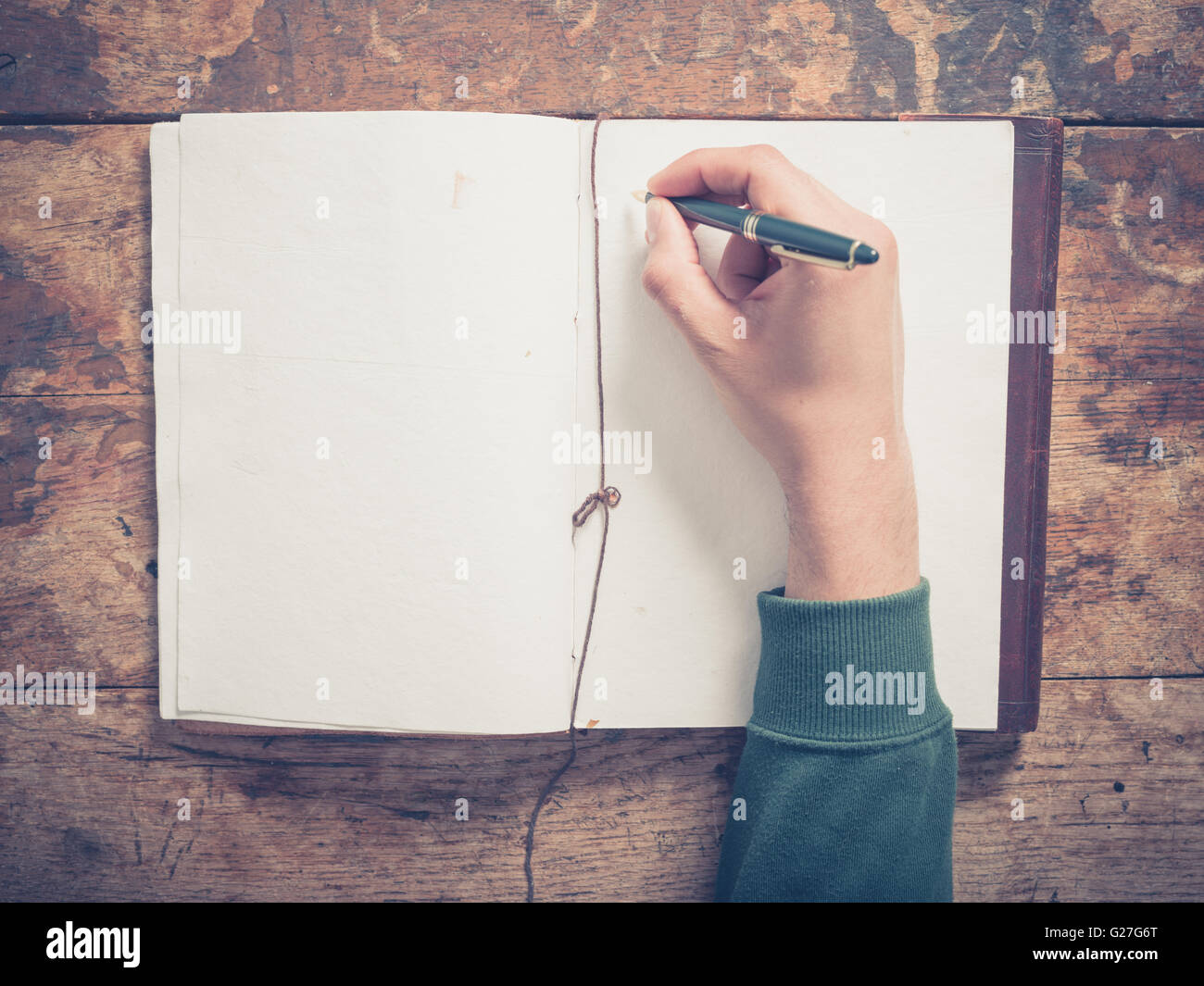 Hand writing with a pen book hi-res stock photography and images - Alamy