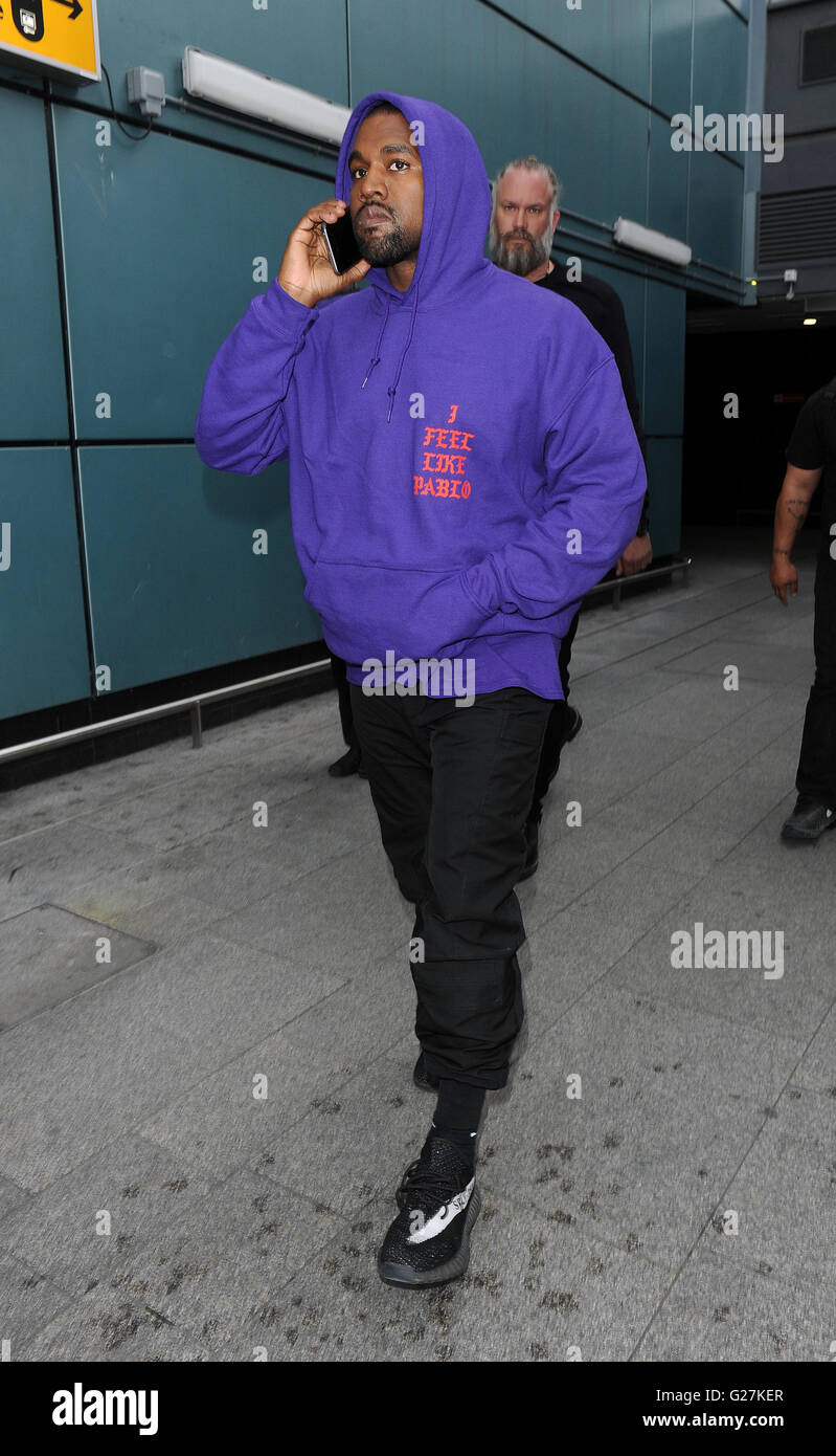 arriving at Heathrow Airport smiles. Kanye was wearing an as yet unreleased pair of his Yeezy Boost 350 trainers, as well as a Pablo hoodie, to promote his new