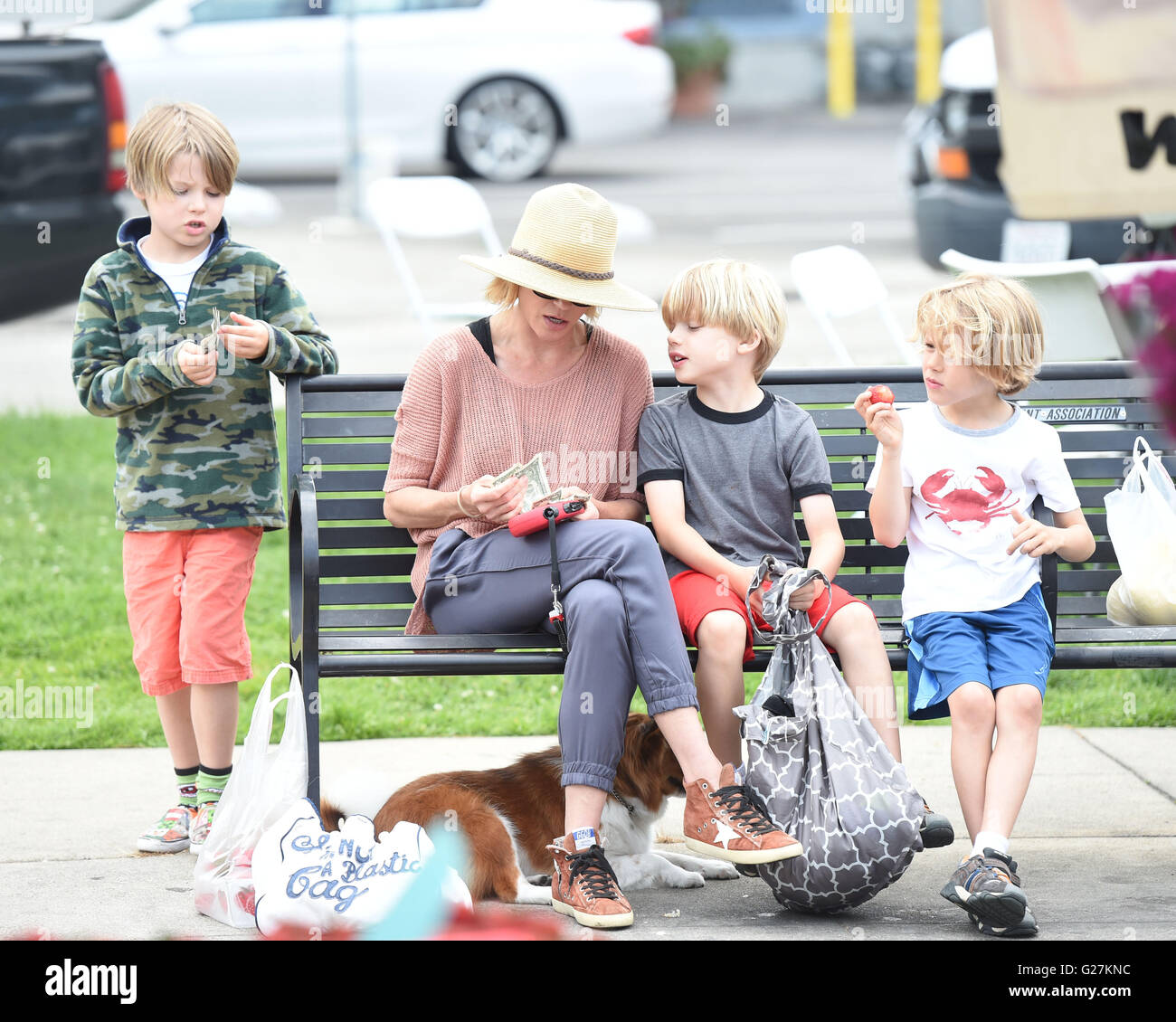 Julie Bowen entertains her three boys during a trip to the Farmers Market  Featuring: Julie Bowen, Oliver McLanahan Phillips, John Phillips, Gustav Phillips Where: Los Angeles, California, United States When: 10 Apr 2016 Stock Photo