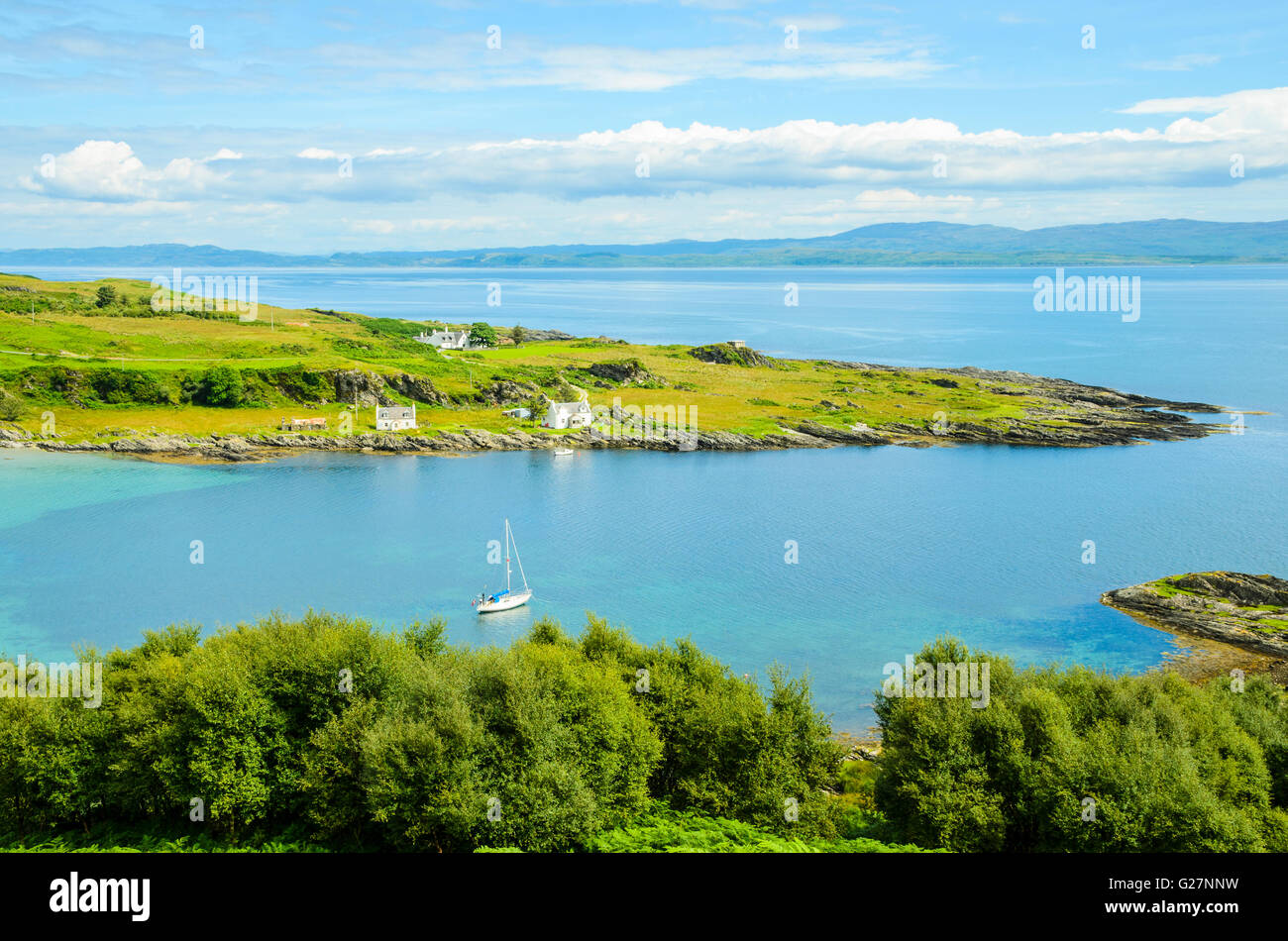 View over Tarbert Bay on the island of Jura Scotland looking across the Sound of Jura to Knapdale Stock Photo