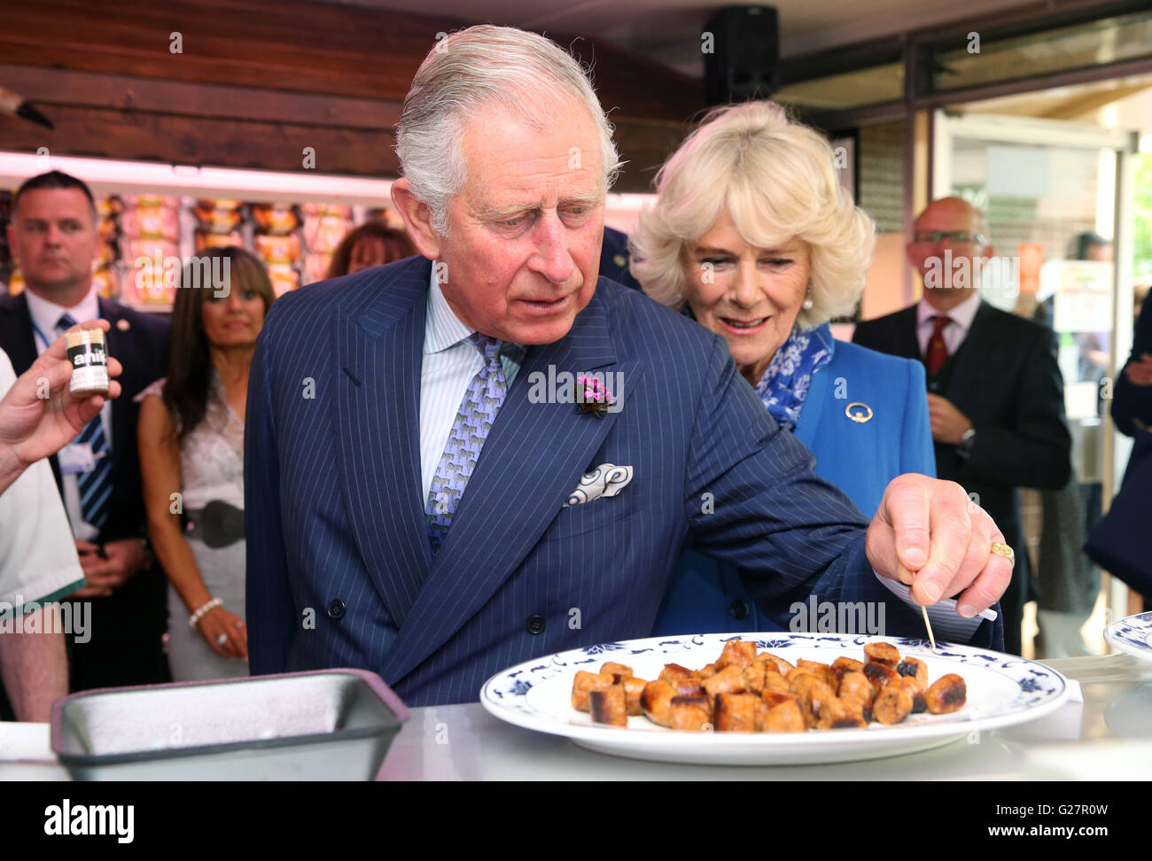 Prince charles camilla eating food sausage hires stock photography and images Alamy