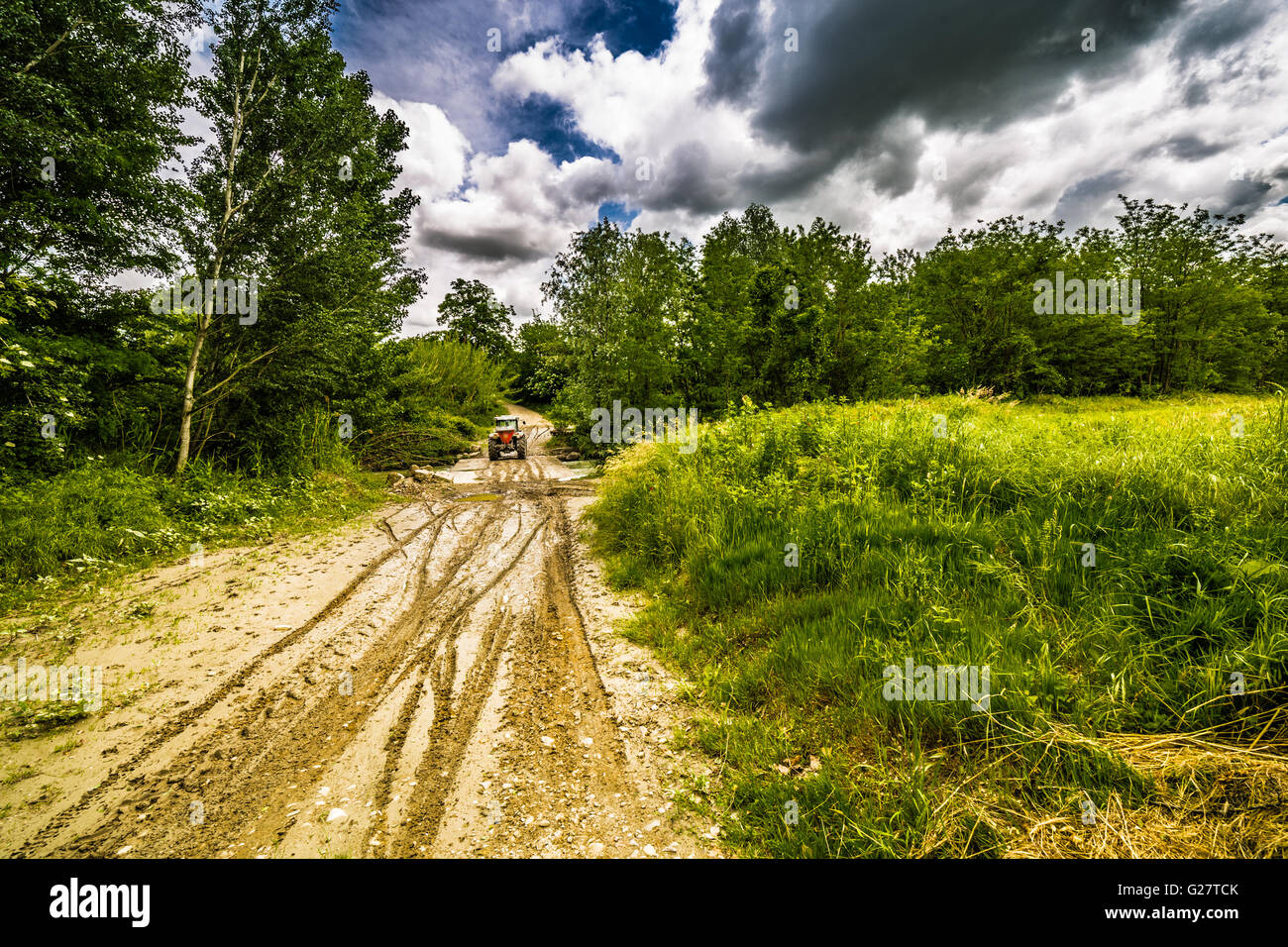 ruts in the mud on the dirt road left by tractor on the Apennines hills of Tuscany and Romagna Stock Photo