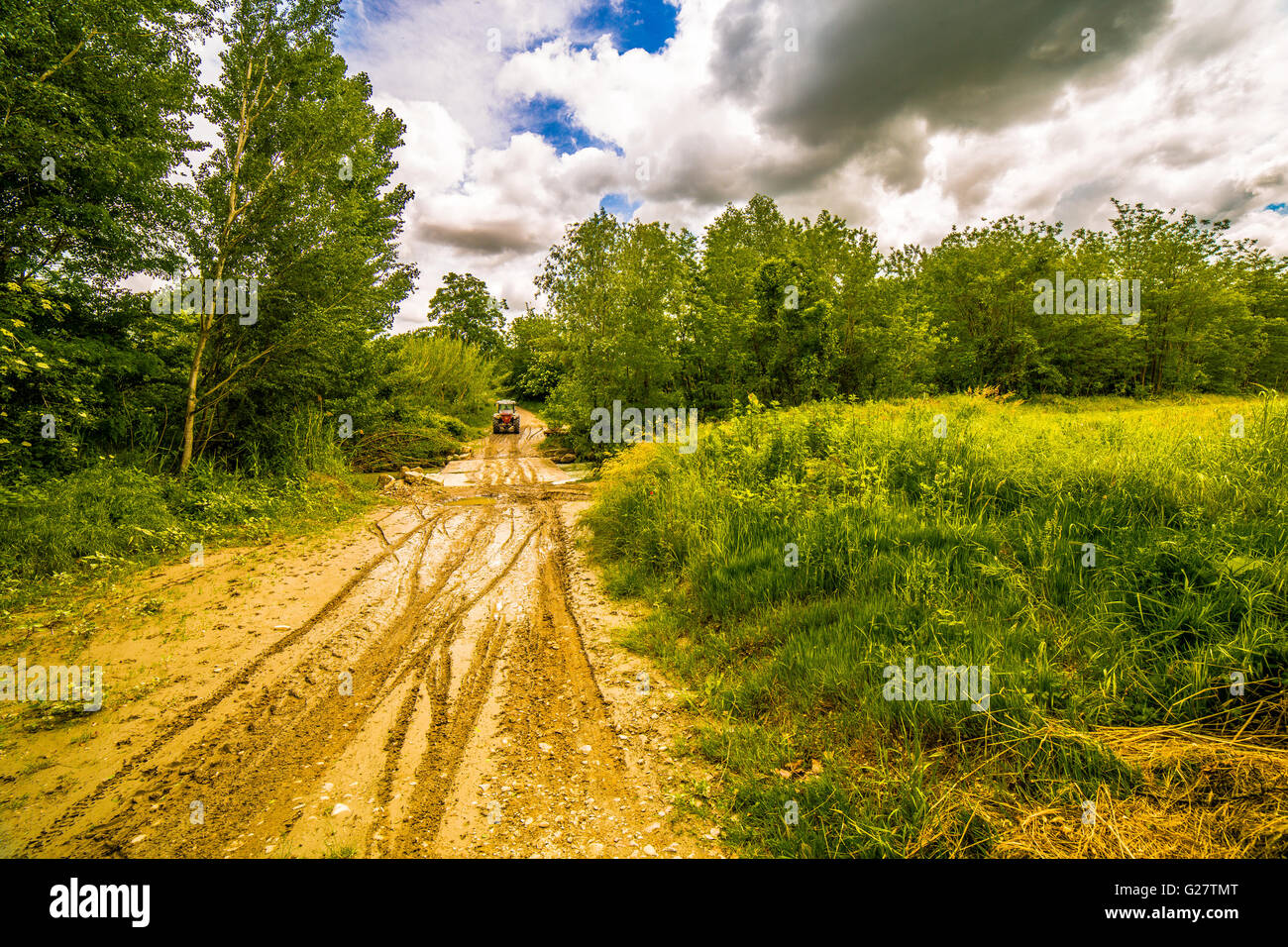 ruts in the mud on the dirt road left by tractor on the Apennines hills of Tuscany and Romagna Stock Photo