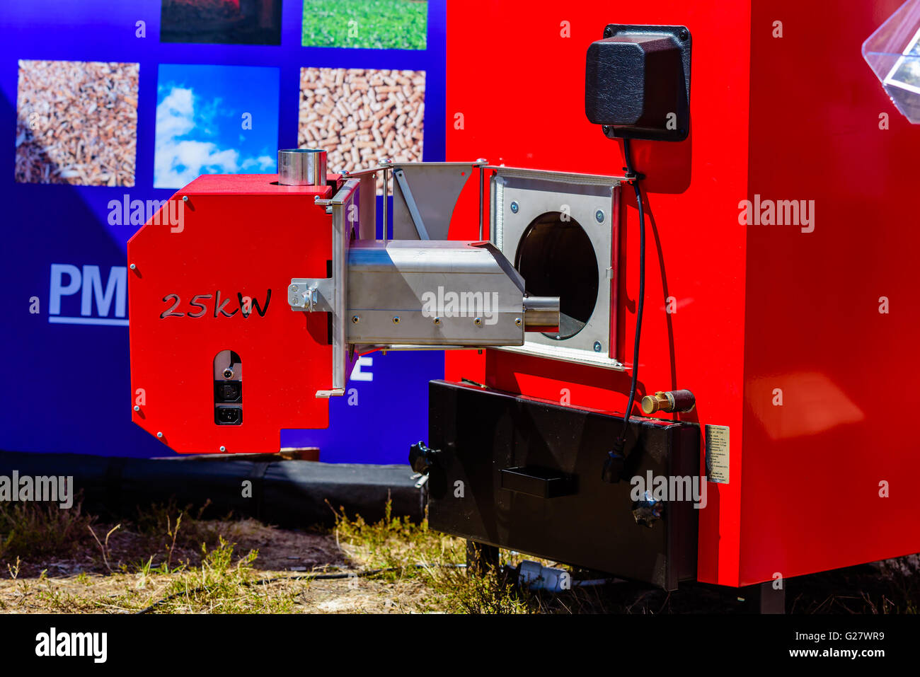 Emmaboda, Sweden - May 13, 2016: Forest and tractor (Skog och traktor) fair. Side part of the Ulma basic 25 kW wood pellet burne Stock Photo