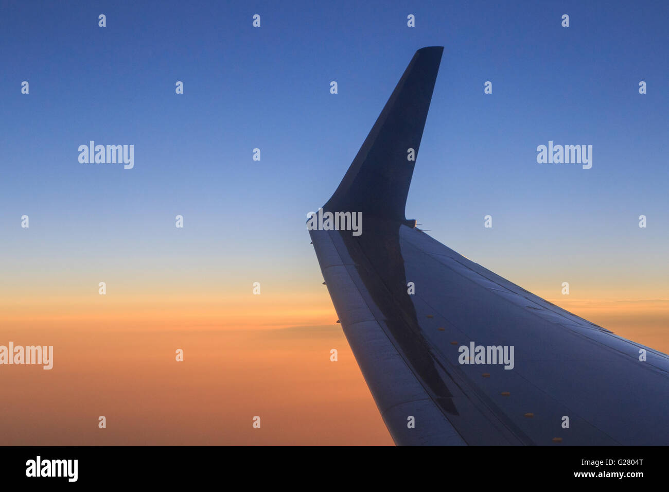 view on sunset from aircraft Stock Photo