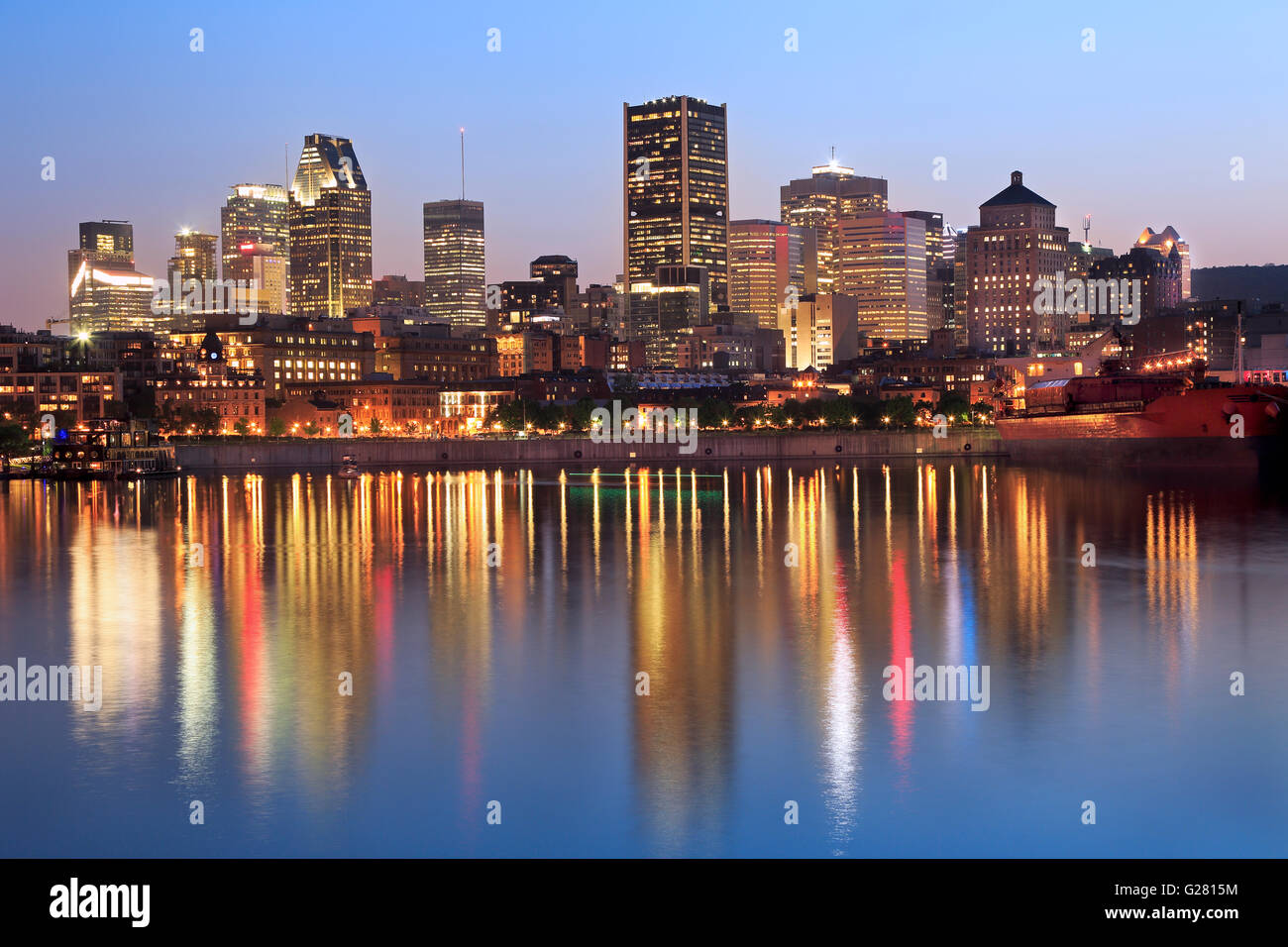 Montreal skyline at dusk and St Lawrence River, Quebec, Canada Stock Photo