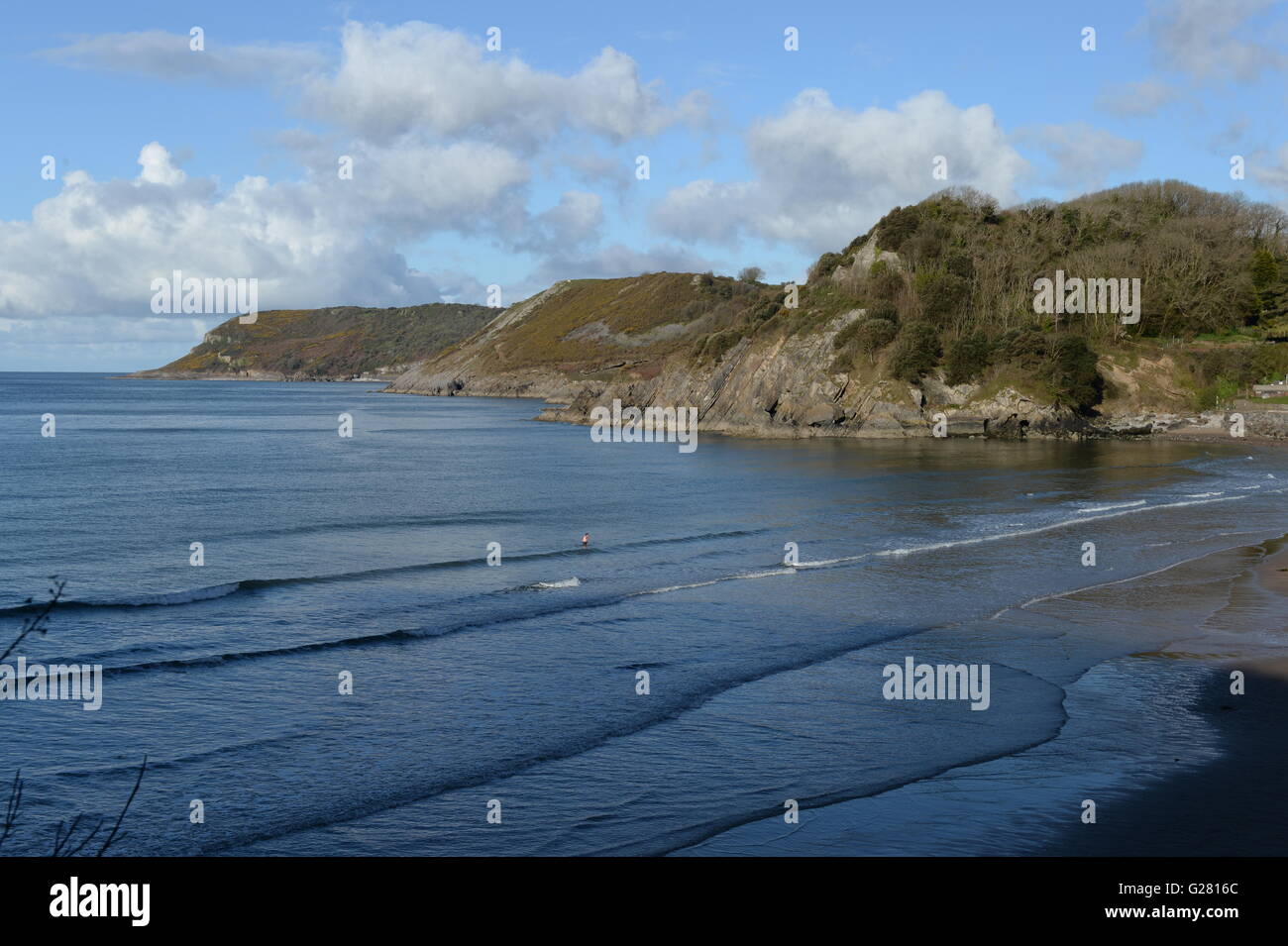 Shelterd bay in Wales surrounded by cliffs and headlands Stock Photo