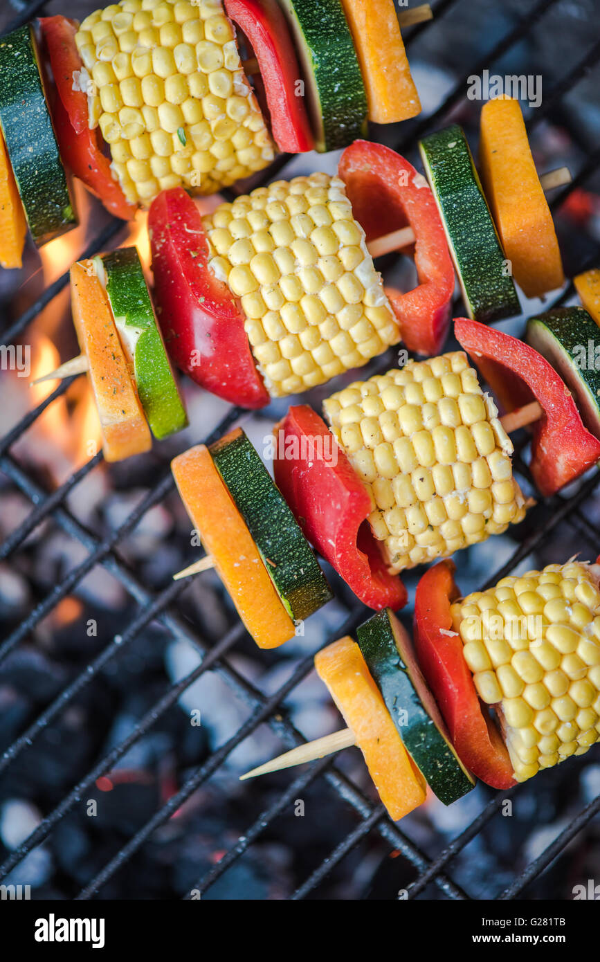 healthy bbq skewers on grill with flames, top view Stock Photo Alamy