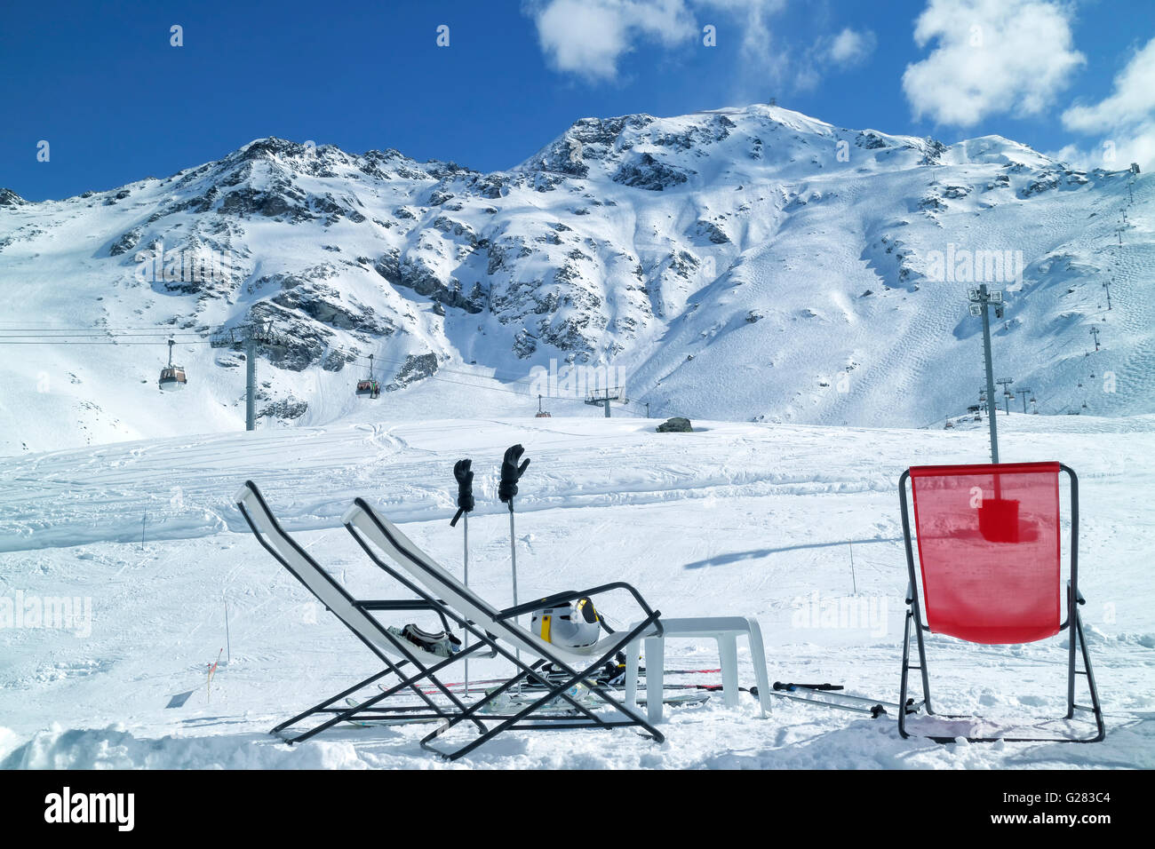 Apres ski at high Alps mountains winter resort of Les Arcs. Red and