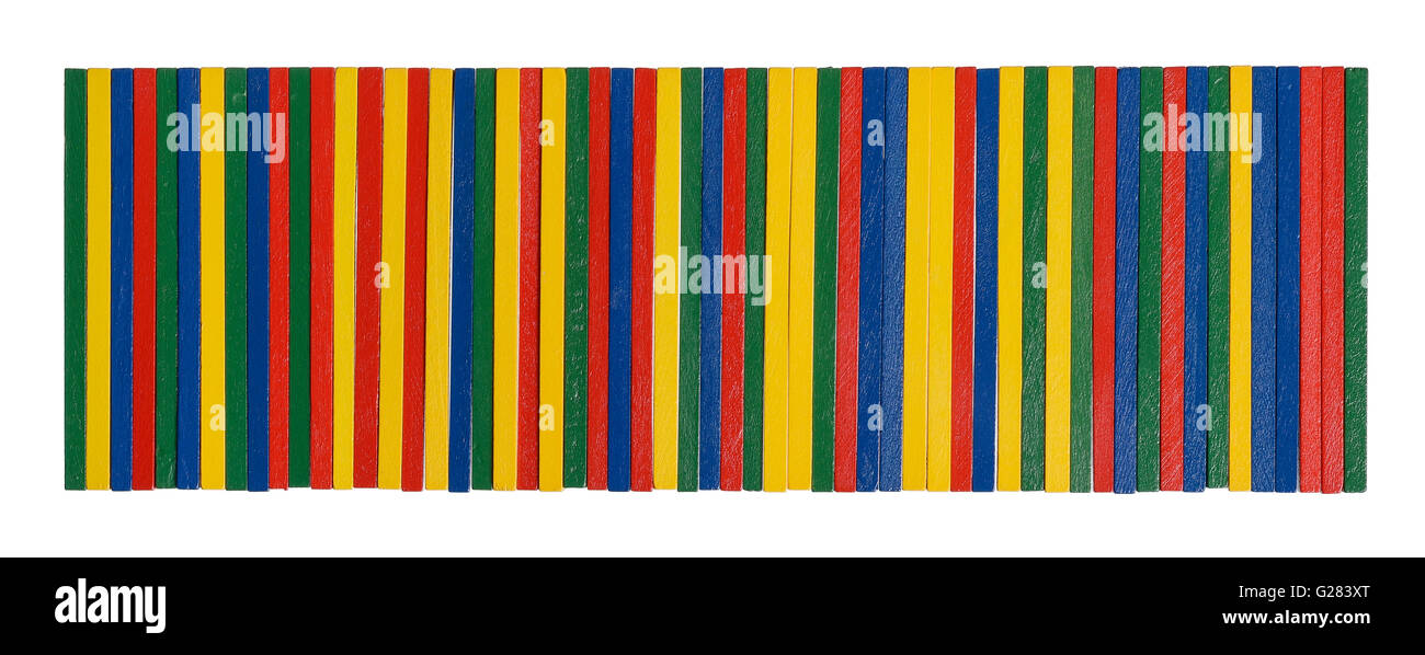 Neat line of coloured wooden sticks Stock Photo