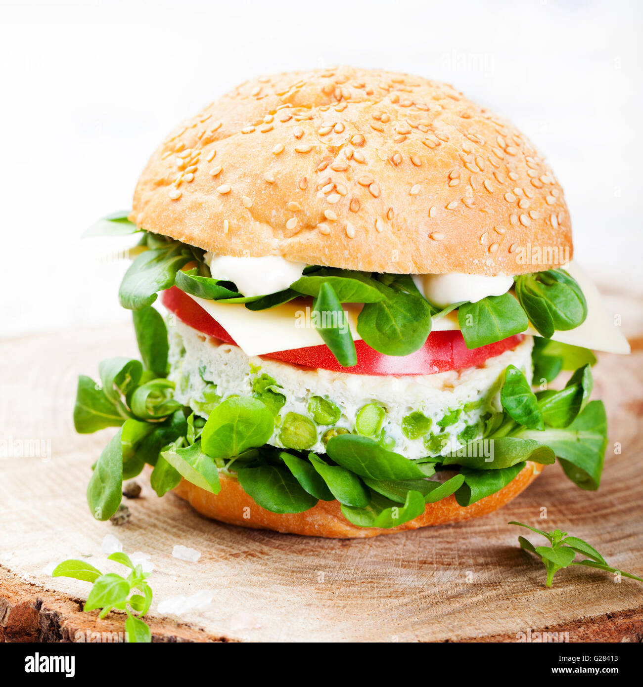 Vegetarian burger with egg, pea patty, fresh salad Stock Photo Alamy