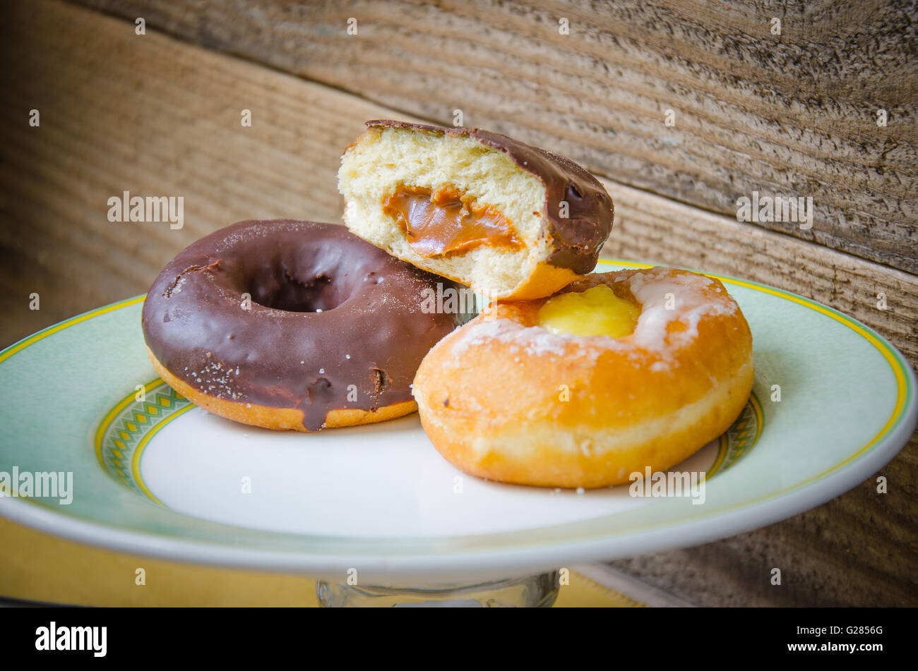 Sweet donuts for breakfast Stock Photo Alamy