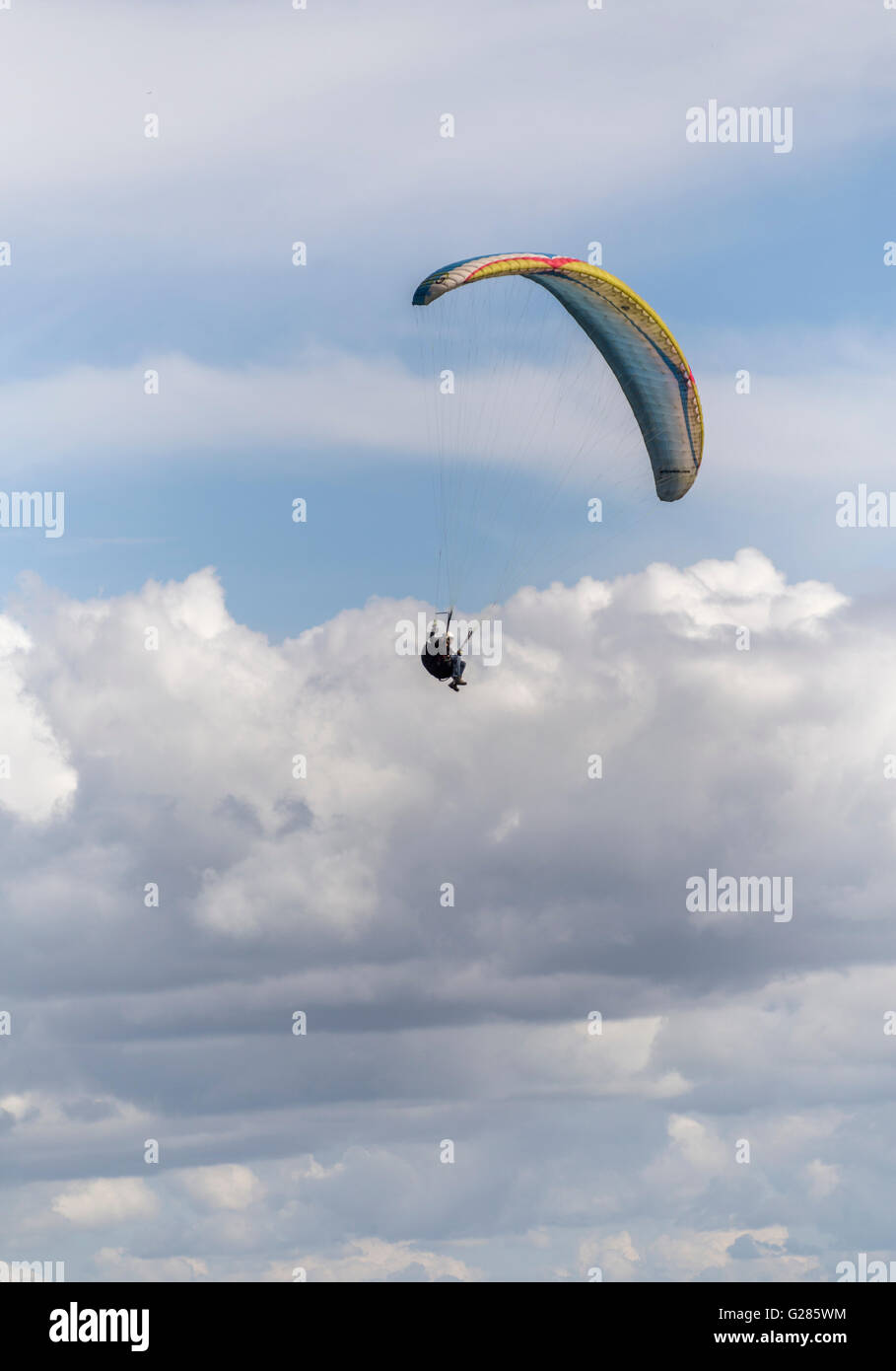 Pilot flying a paraglider at Parlick Pike, Ribble Valley, Lancashire