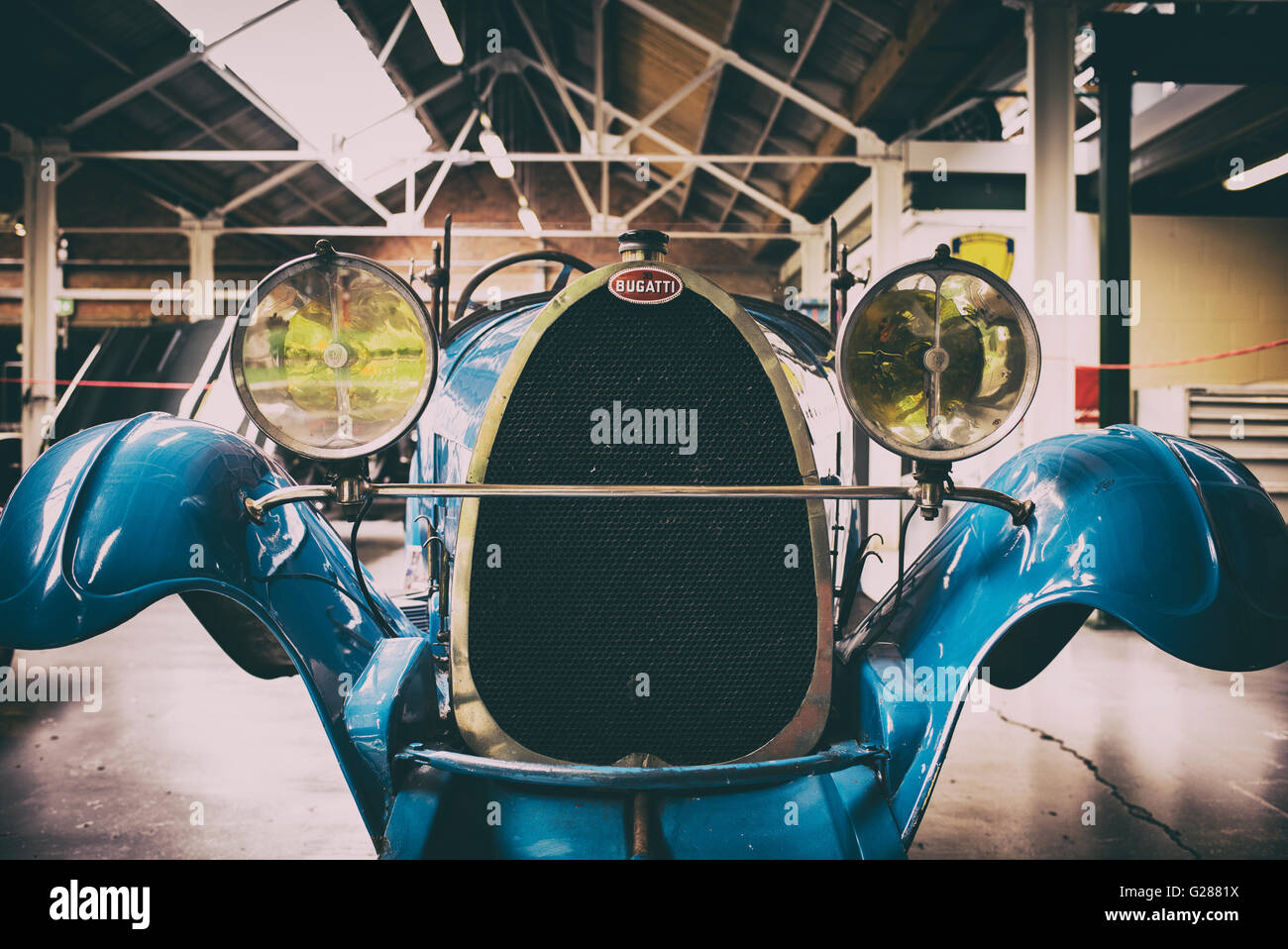 Vintage Bugatti in a restoration garage at Bicester Heritage Centre. Oxfordshire, England. Vintage filter applied Stock Photo