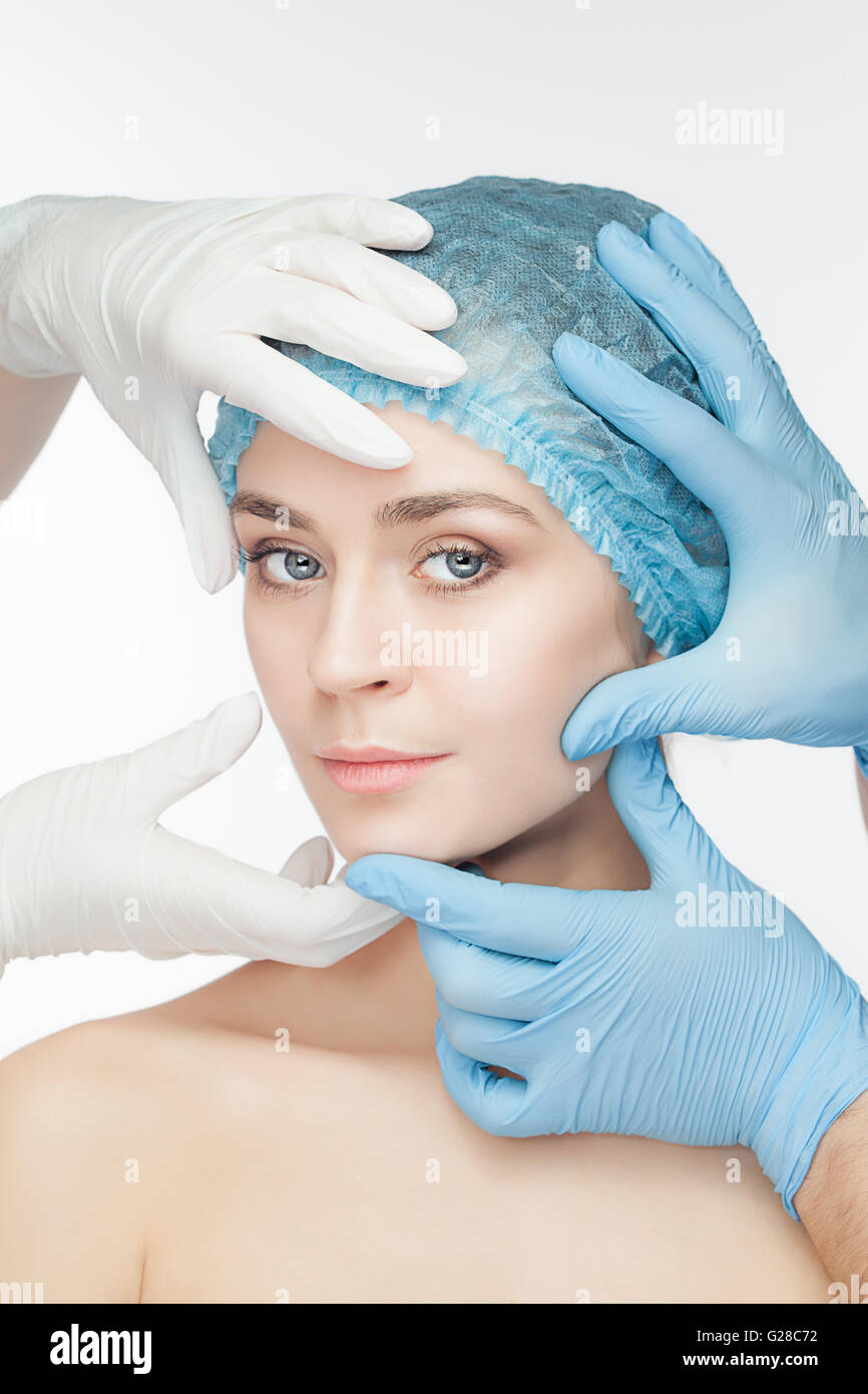 Attractive woman at plastic surgery with syringe in her face Stock ...