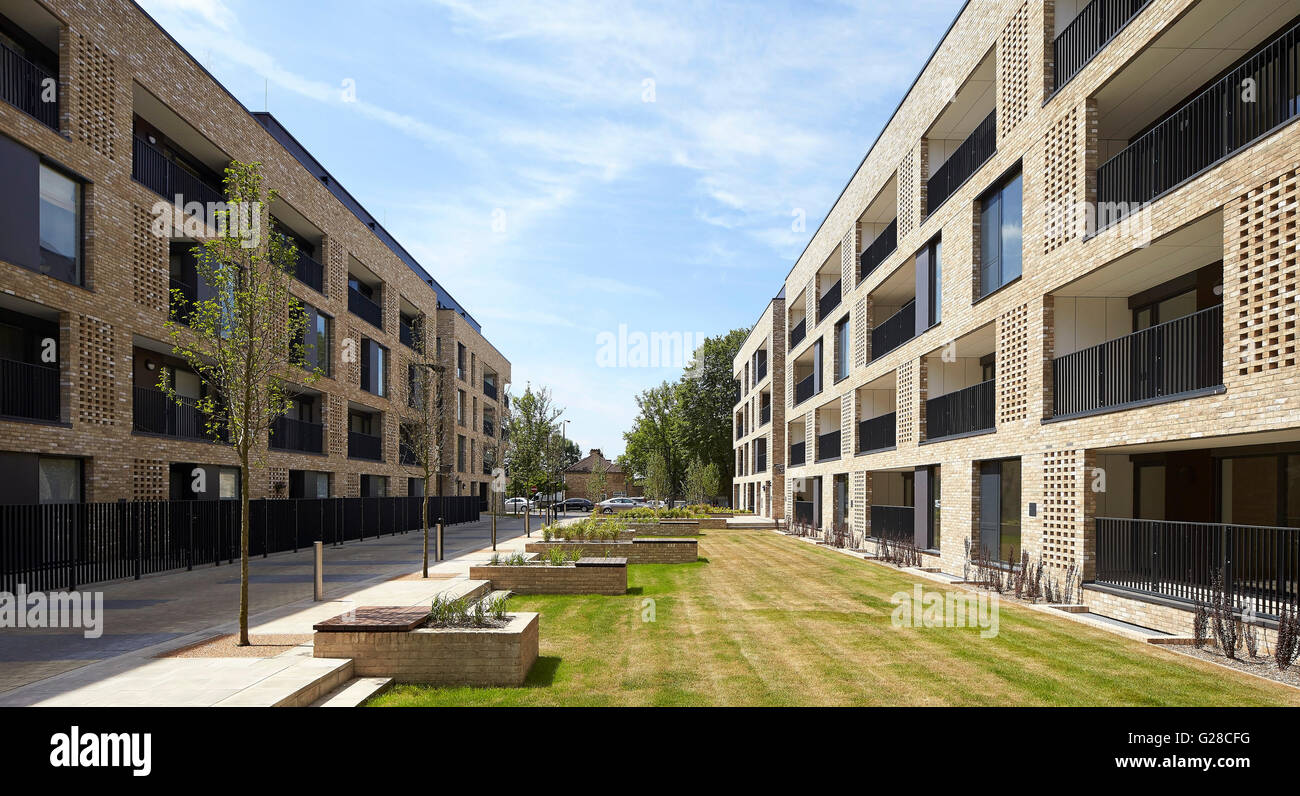 Housing complex with landscaped public spaces. Alpine Place, Brent, London, United Kingdom. Architect: Ayre Chamberlain Gaunt, 2015. Stock Photo