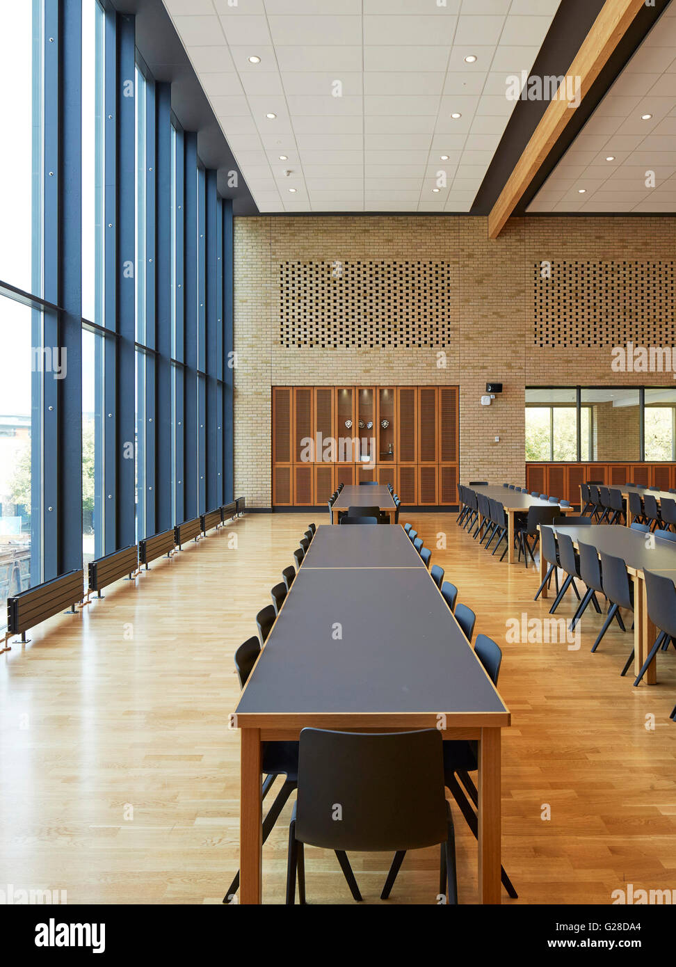 Empty dining hall. The Barn, Sutton Bonington Campus, Nottingham, United Kingdom. Architect: Make Ltd, 2015. Stock Photo