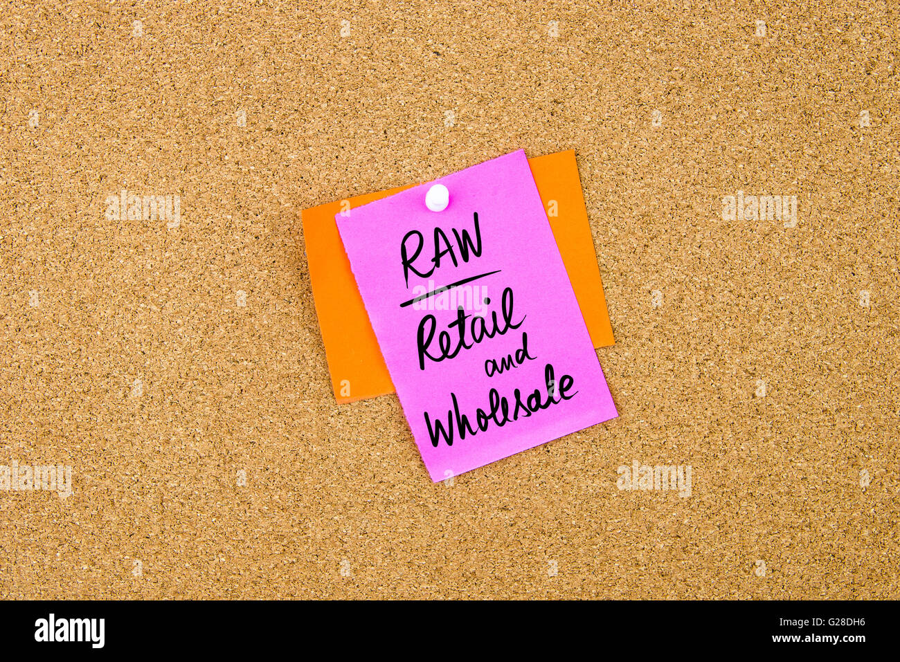 Business Acronym RAW as Retail and Wholesale written on paper note pinned on cork board with white thumbtack, copy space available Stock Photo