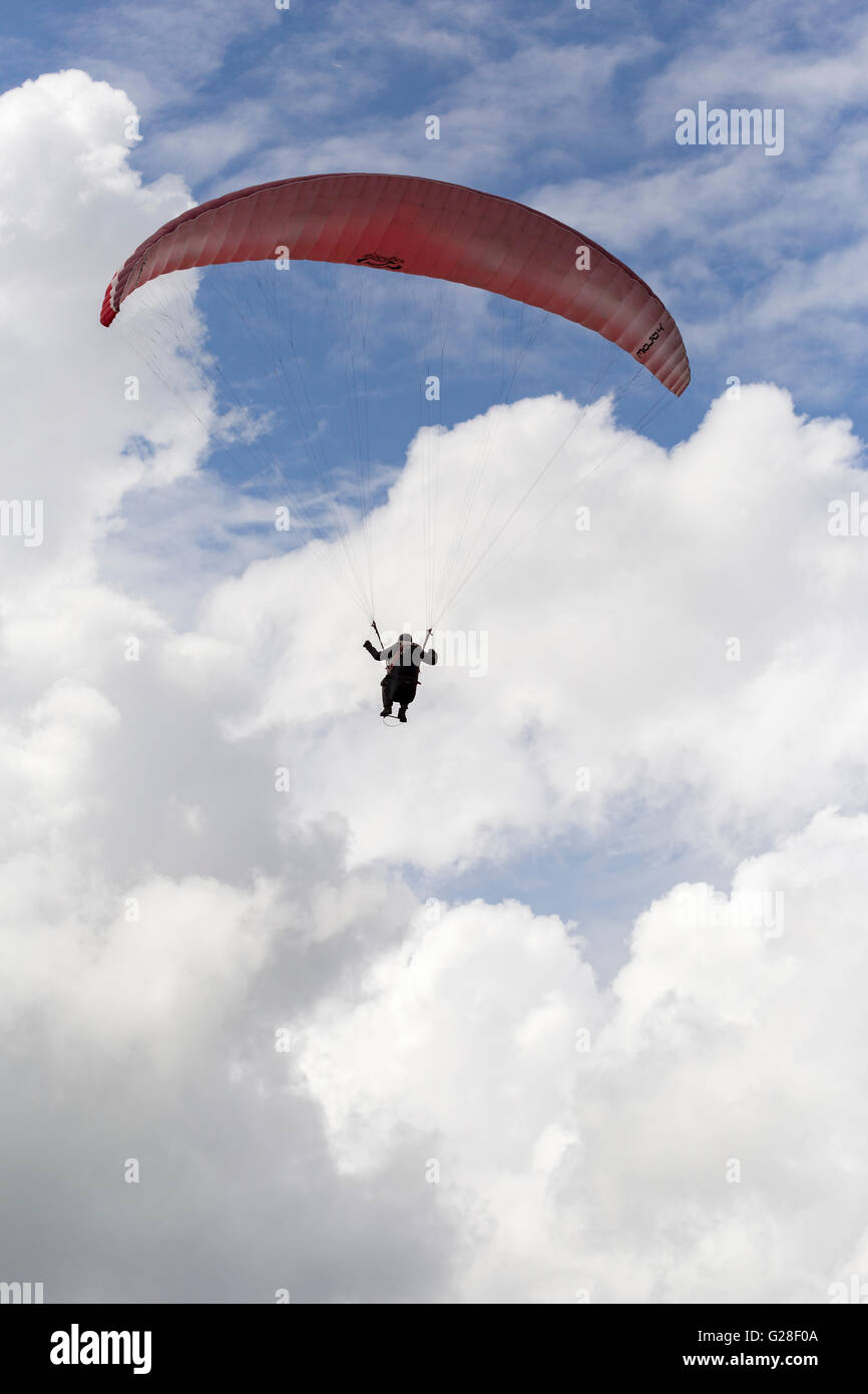 Pilot flying a paraglider at Parlick Pike, Ribble Valley, Lancashire