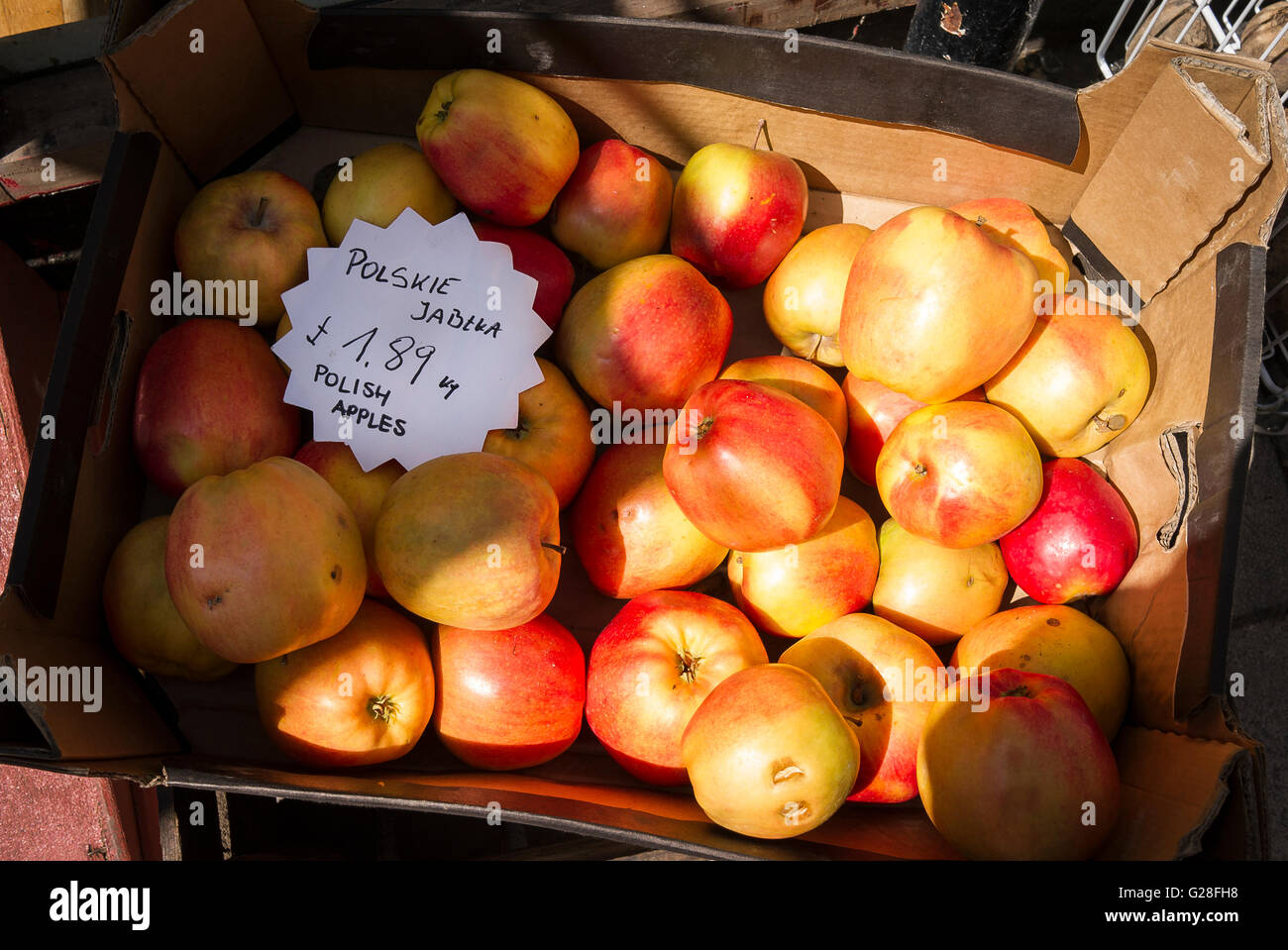 A box of Polish apples outside a specialist deli shop in Devizes UK Stock Photo