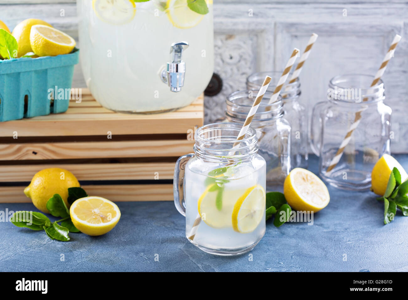 Fresh citrus lemonade in beverage dispenser Stock Photo Alamy