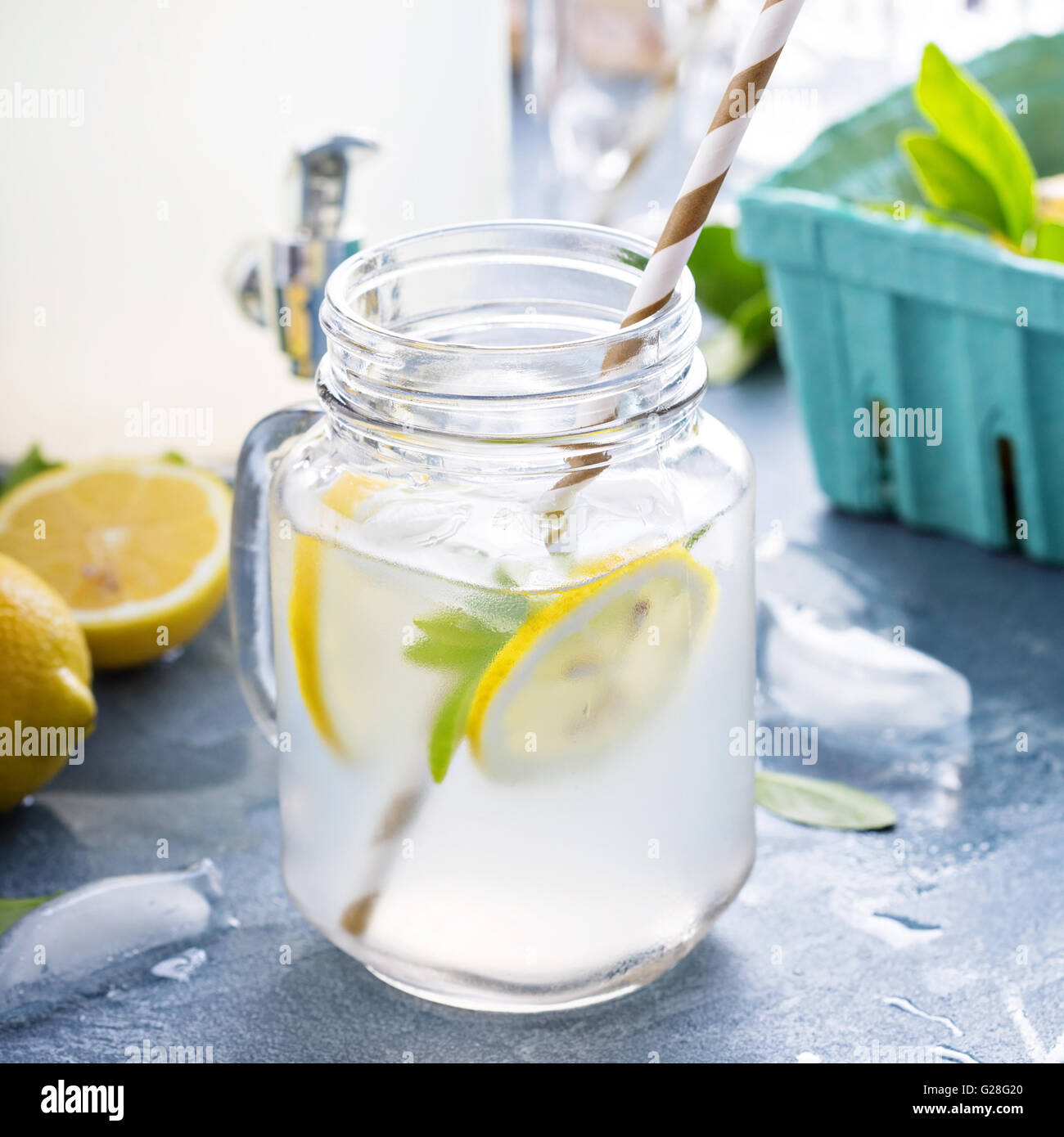 Fresh citrus lemonade in beverage dispenser Stock Photo Alamy