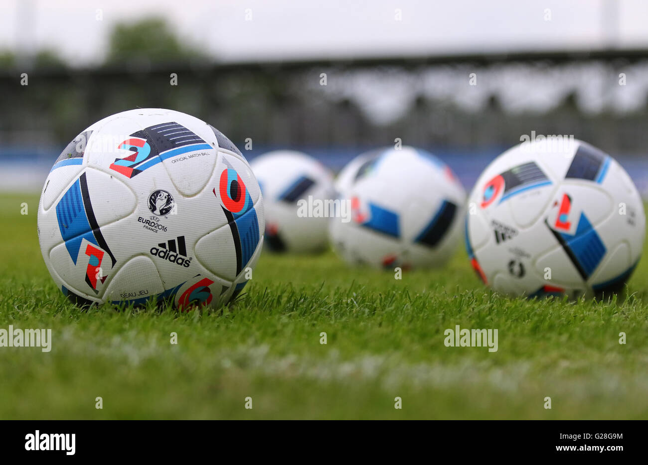 Official match balls of the UEFA EURO 2016 Tournament (Adidas Beau Jeu) on  the grass Stock Photo - Alamy