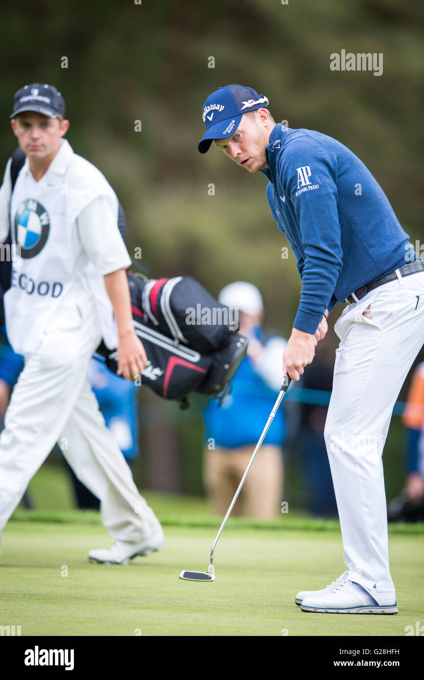 WENTWORTH, UK: May, 25, 2016 Danny Willett putts in the BMW PGA Celebrity Pro-Am, ahead of the Championship at Wentworth. Stock Photo