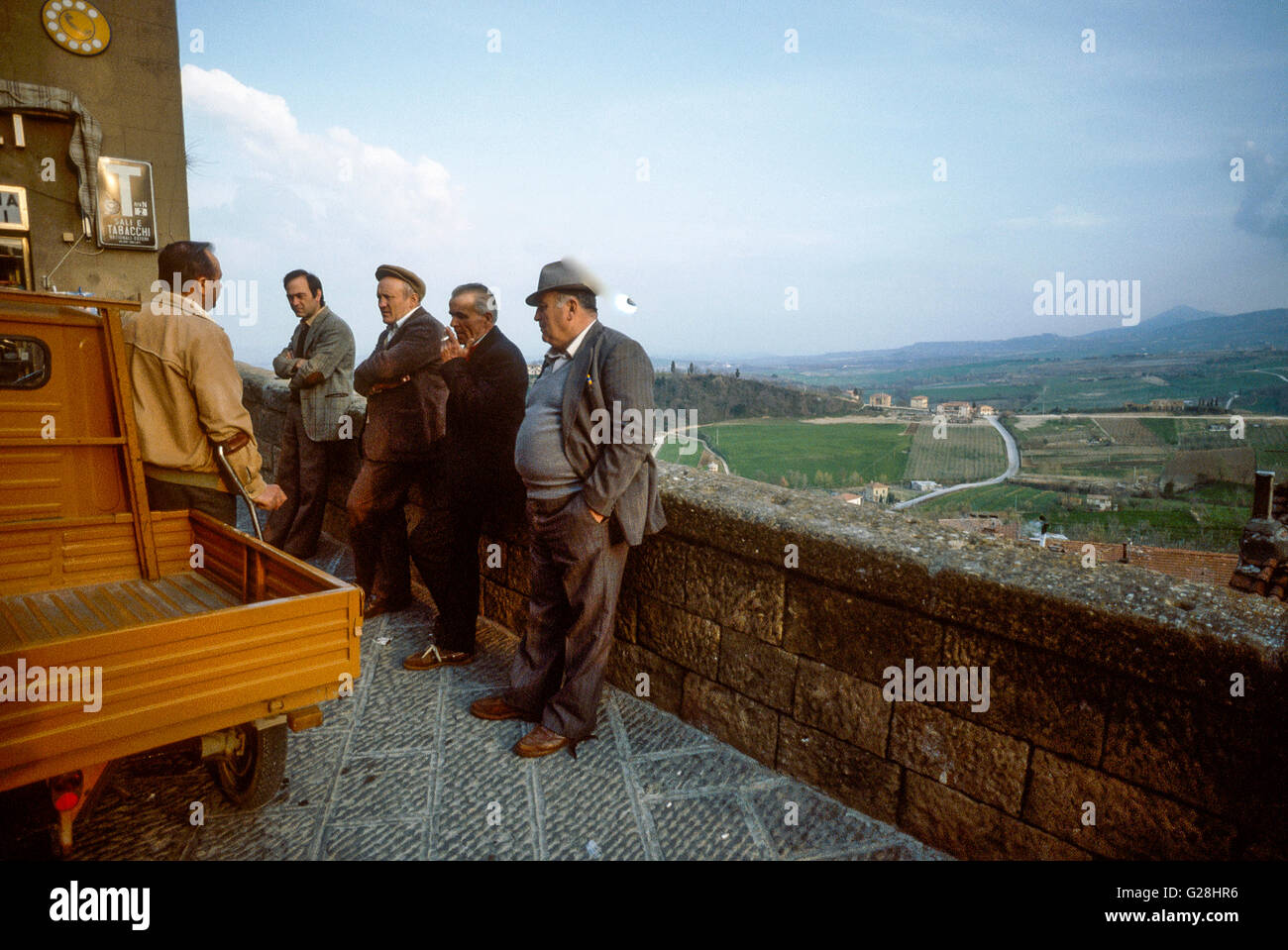 men in the streets of the historic centre of Chianciano, Tuscany, Italy Stock Photo