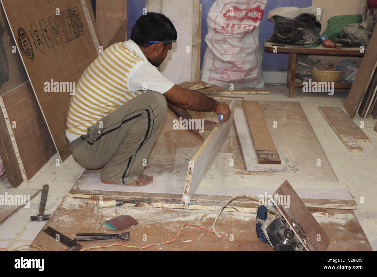 Carpenter is making furniture Stock Photo Alamy
