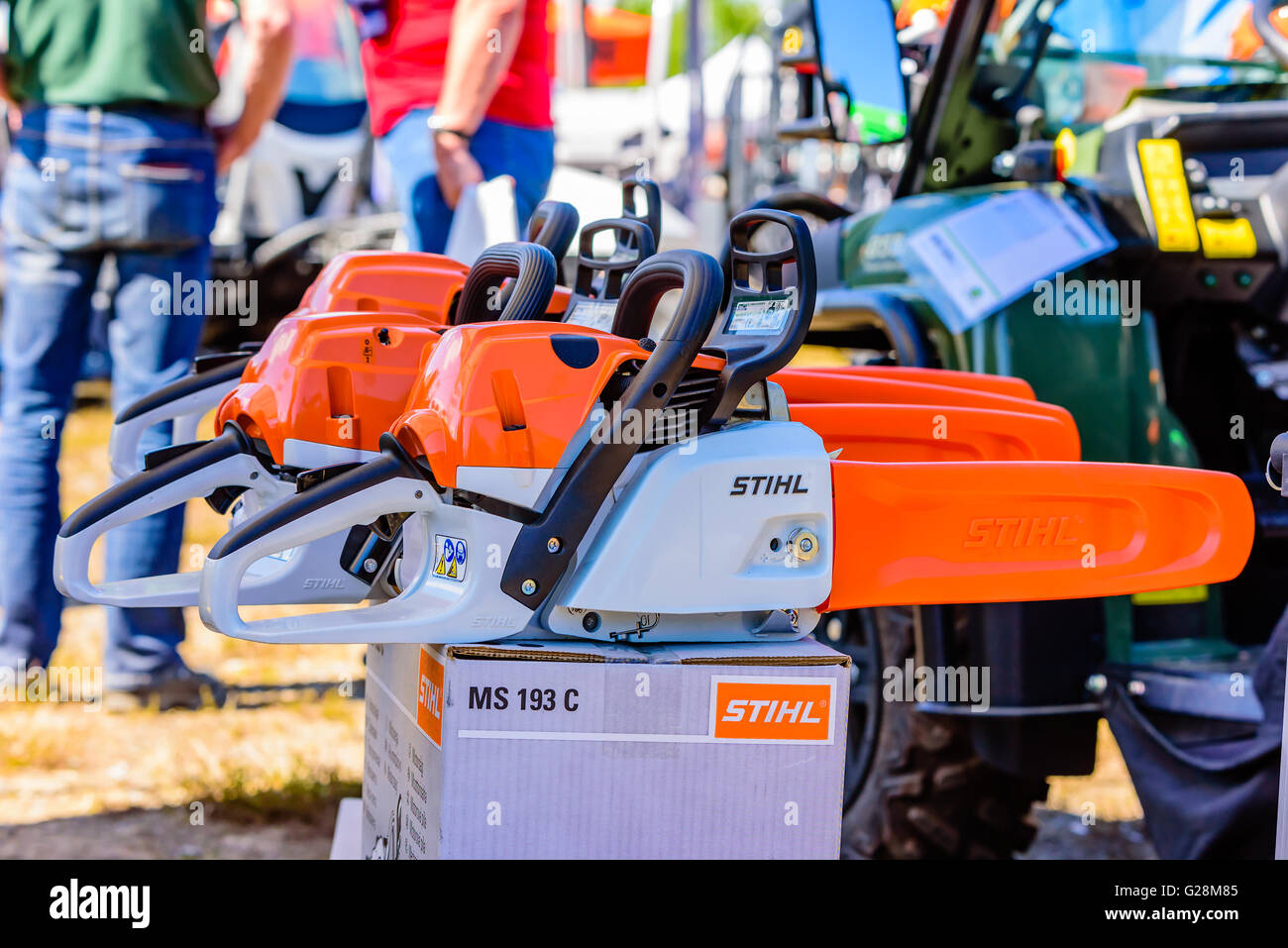 Emmaboda, Sweden - May 13, 2016: Forest and tractor (Skog och traktor) fair. Stihl chainsaw on display with people in the backgr Stock Photo